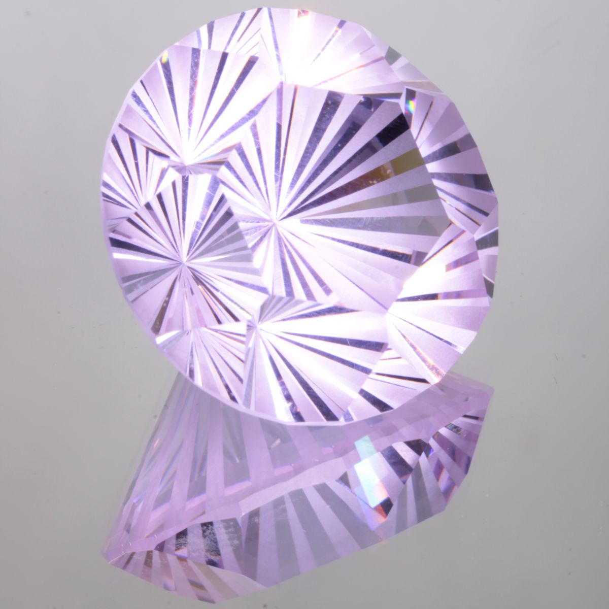 Faceted Pinstripe Pattern Hex Round Pure Nd:YAG Gem
