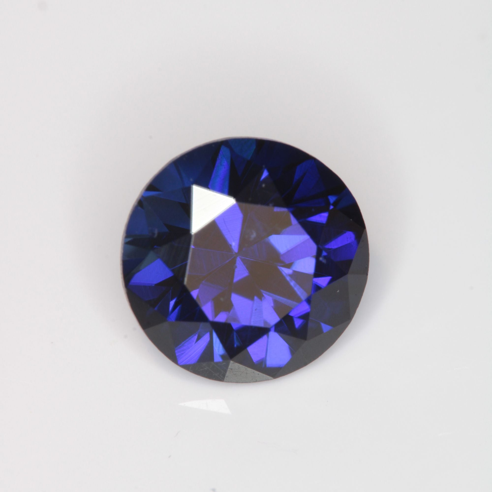 Faceted Flame Fusion Blue Sapphire Round Gemstone