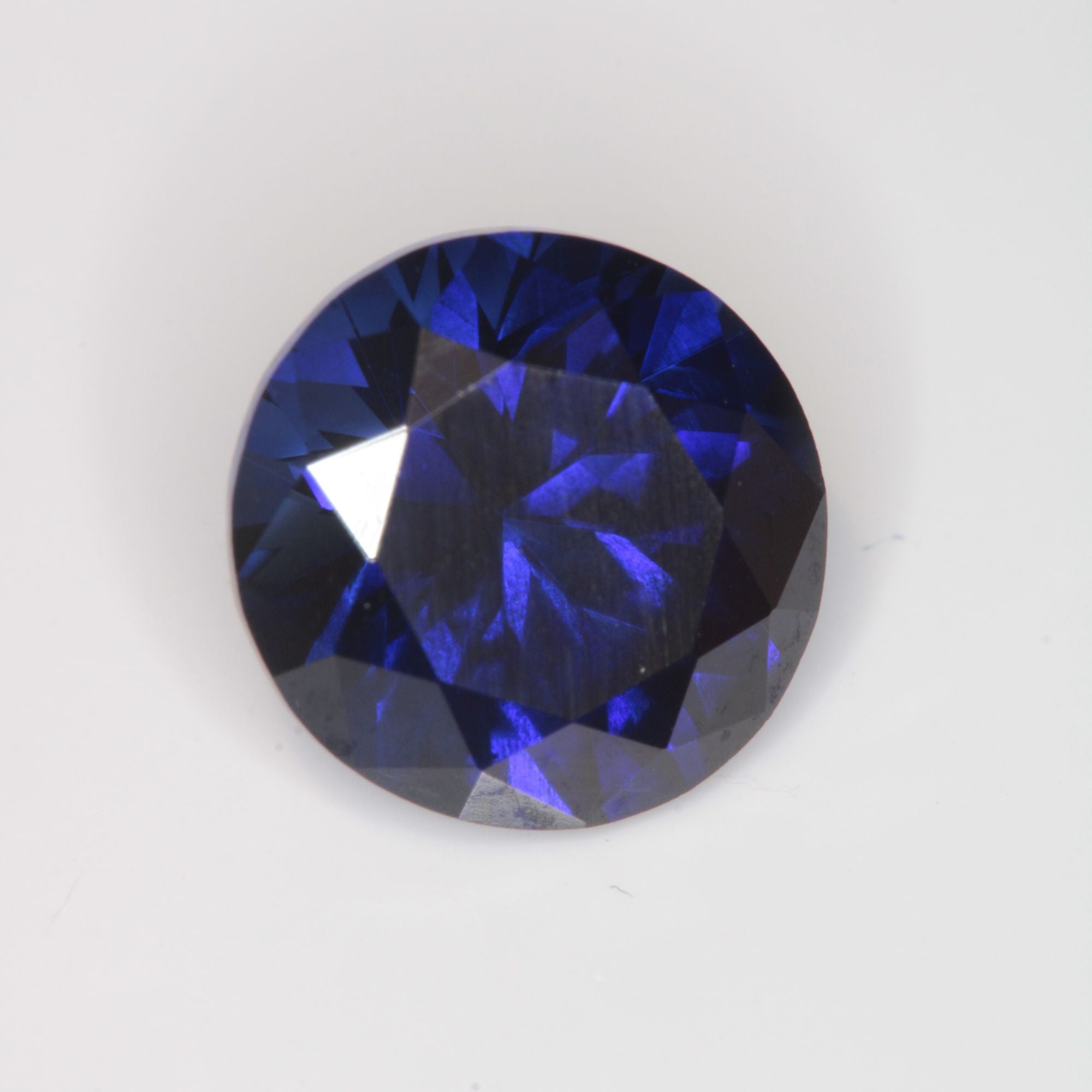 Faceted Flame Fusion Blue Sapphire Round Gemstone