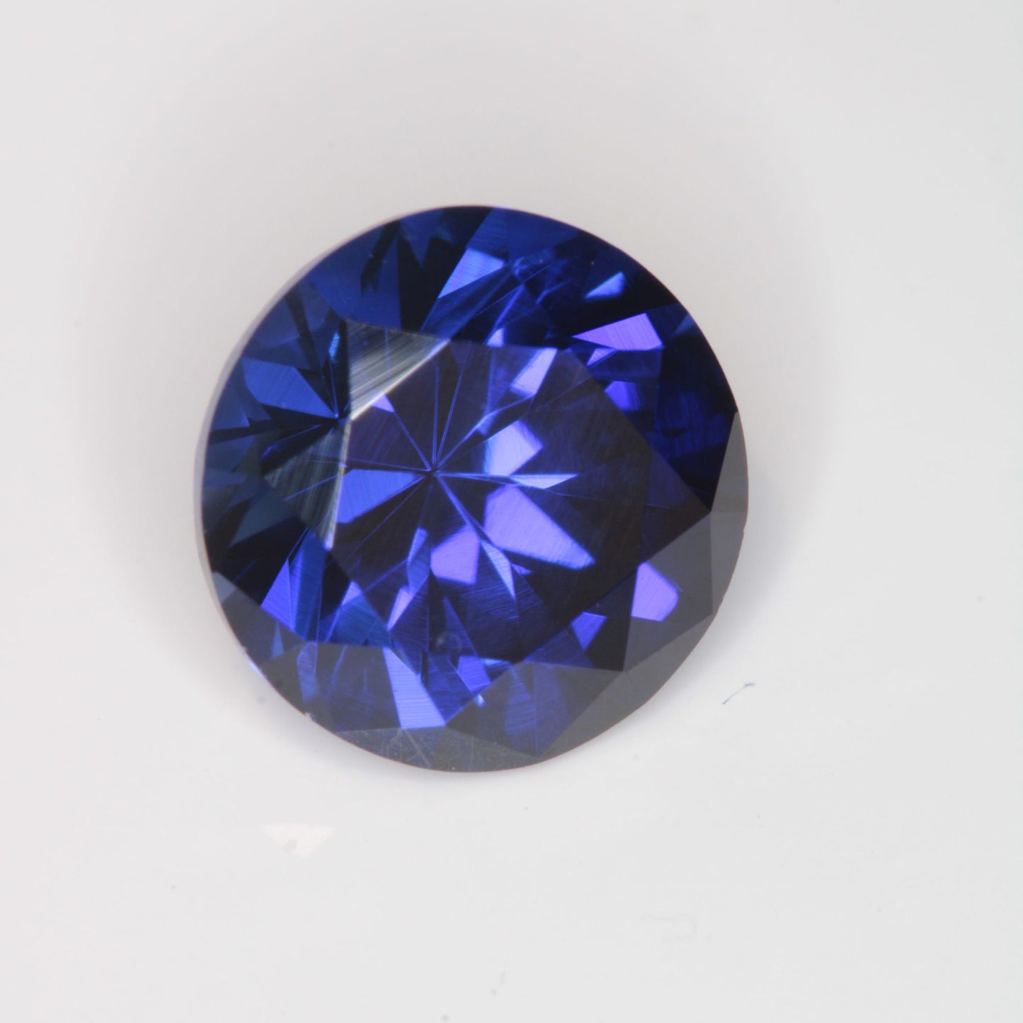 Faceted Flame Fusion Blue Sapphire Round Gemstone