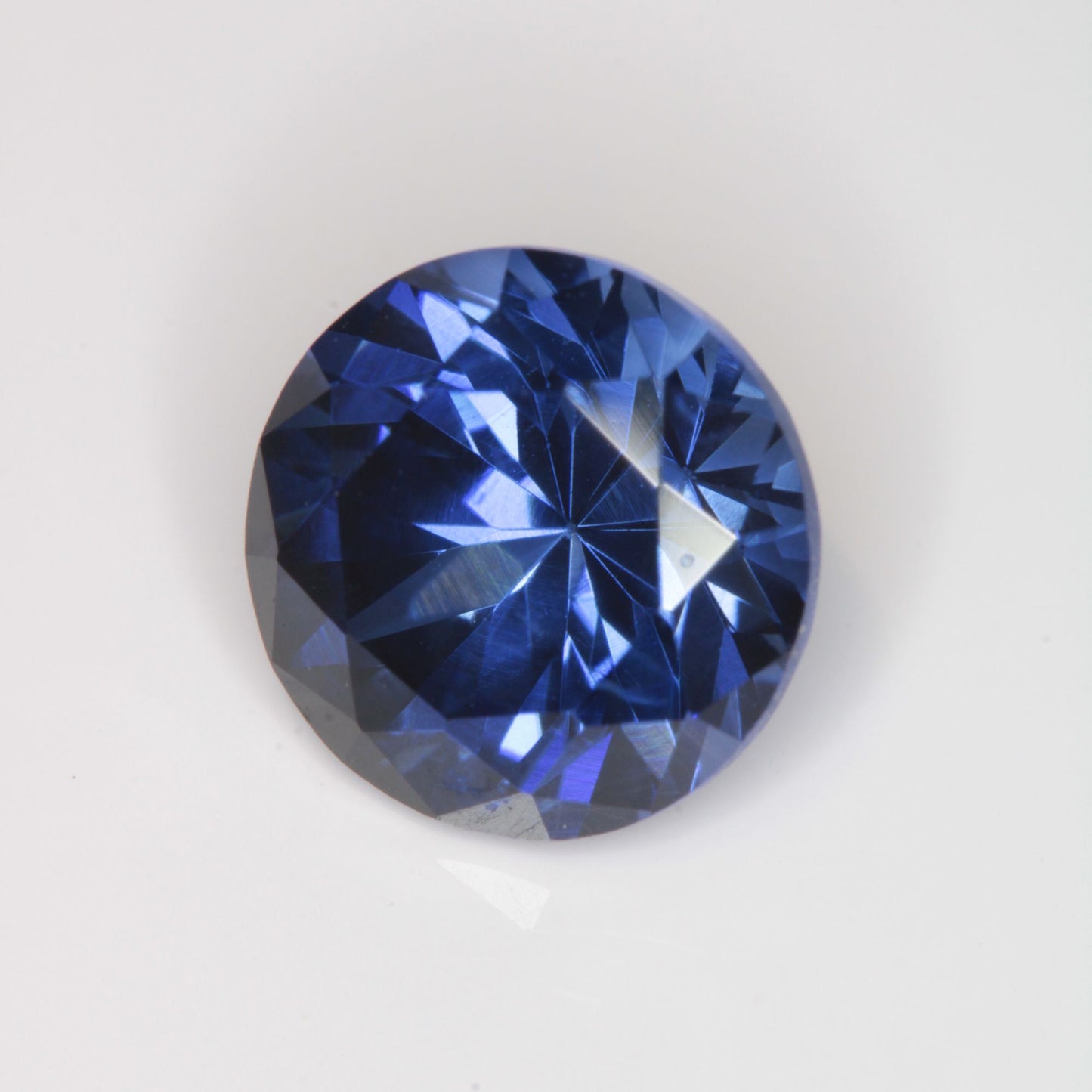 Faceted Flame Fusion Blue Sapphire Round Gemstone
