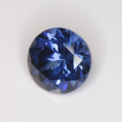Faceted Flame Fusion Blue Sapphire Round Gemstone