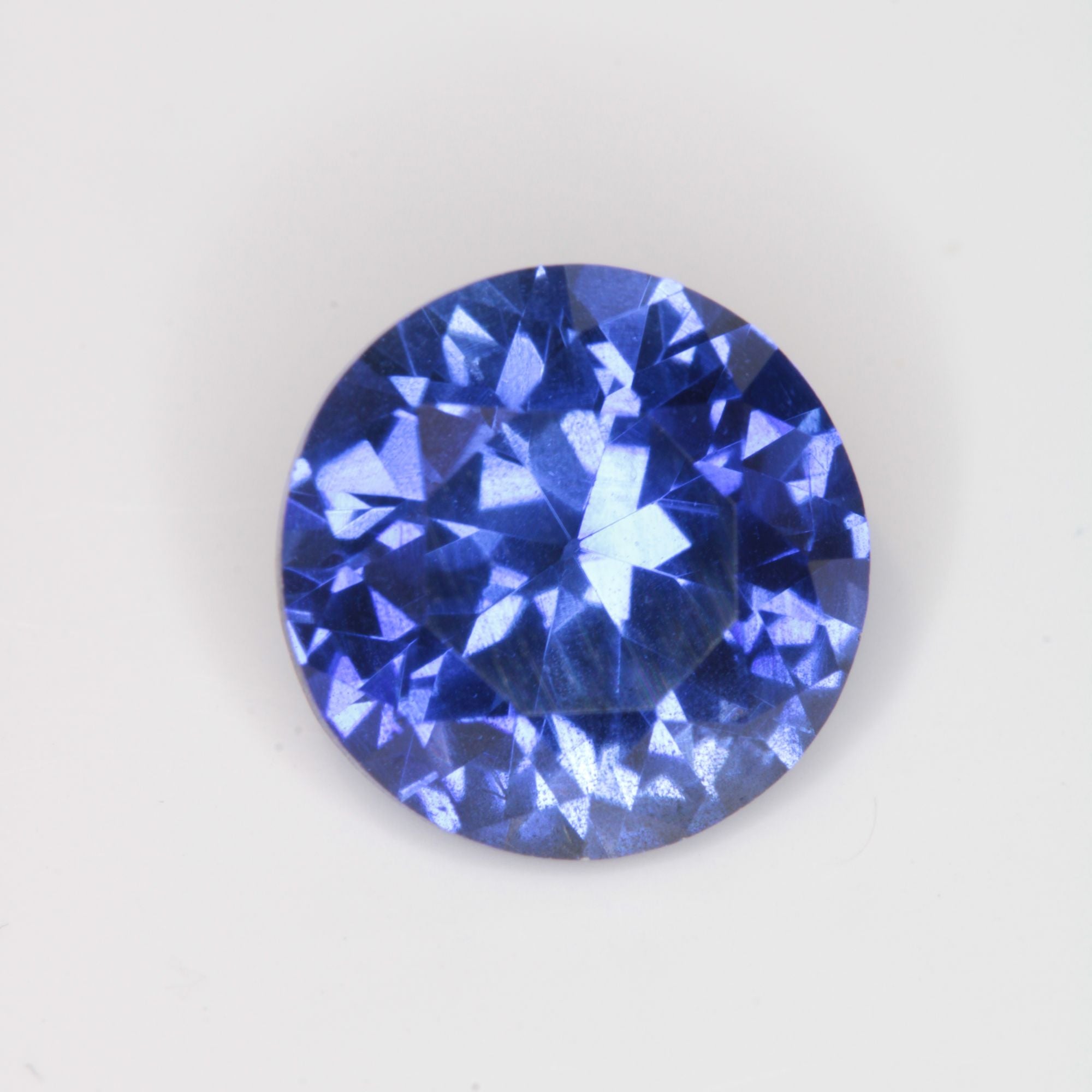 Faceted Flame Fusion Blue Sapphire Round Gemstone