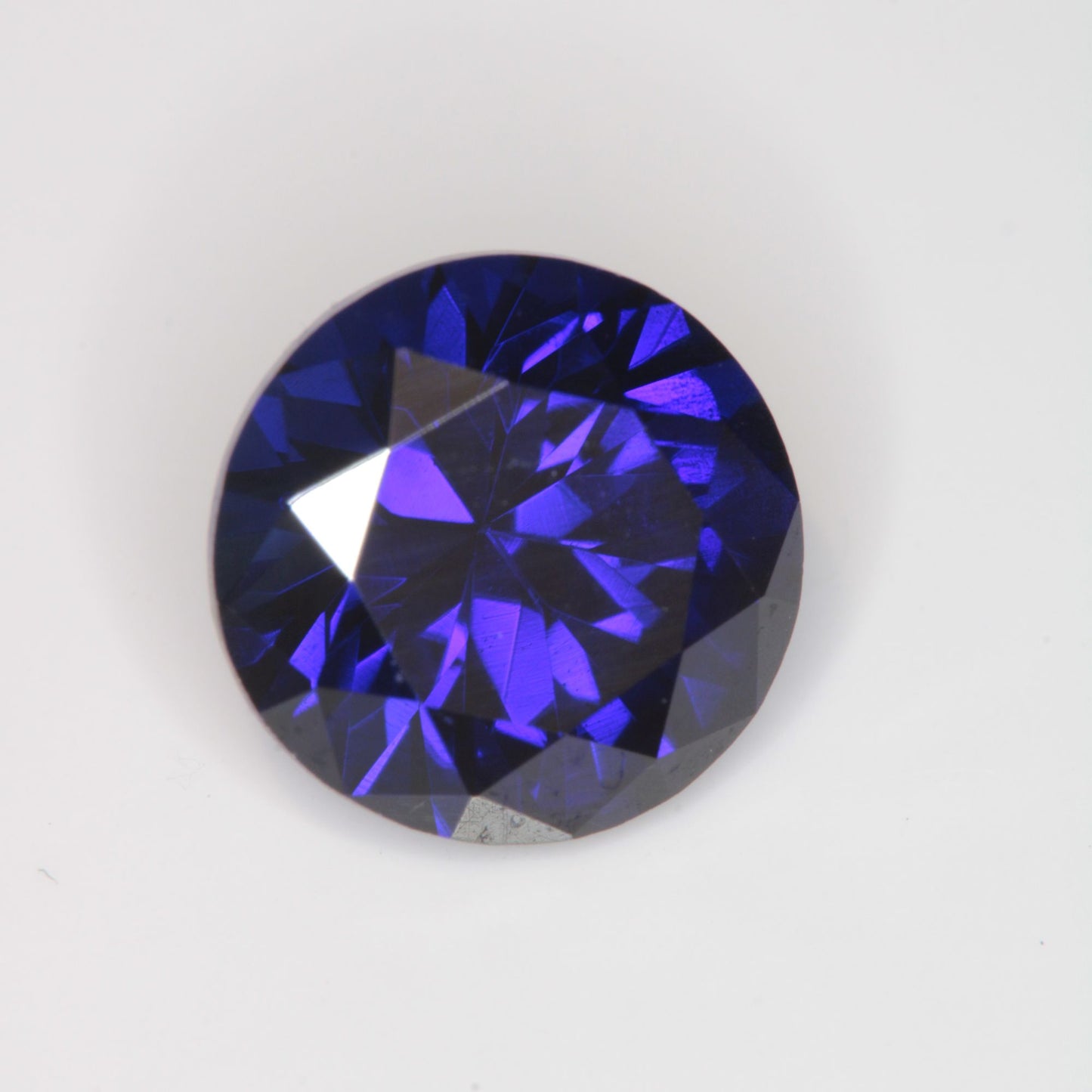 Faceted Flame Fusion Blue Sapphire Round Gemstone