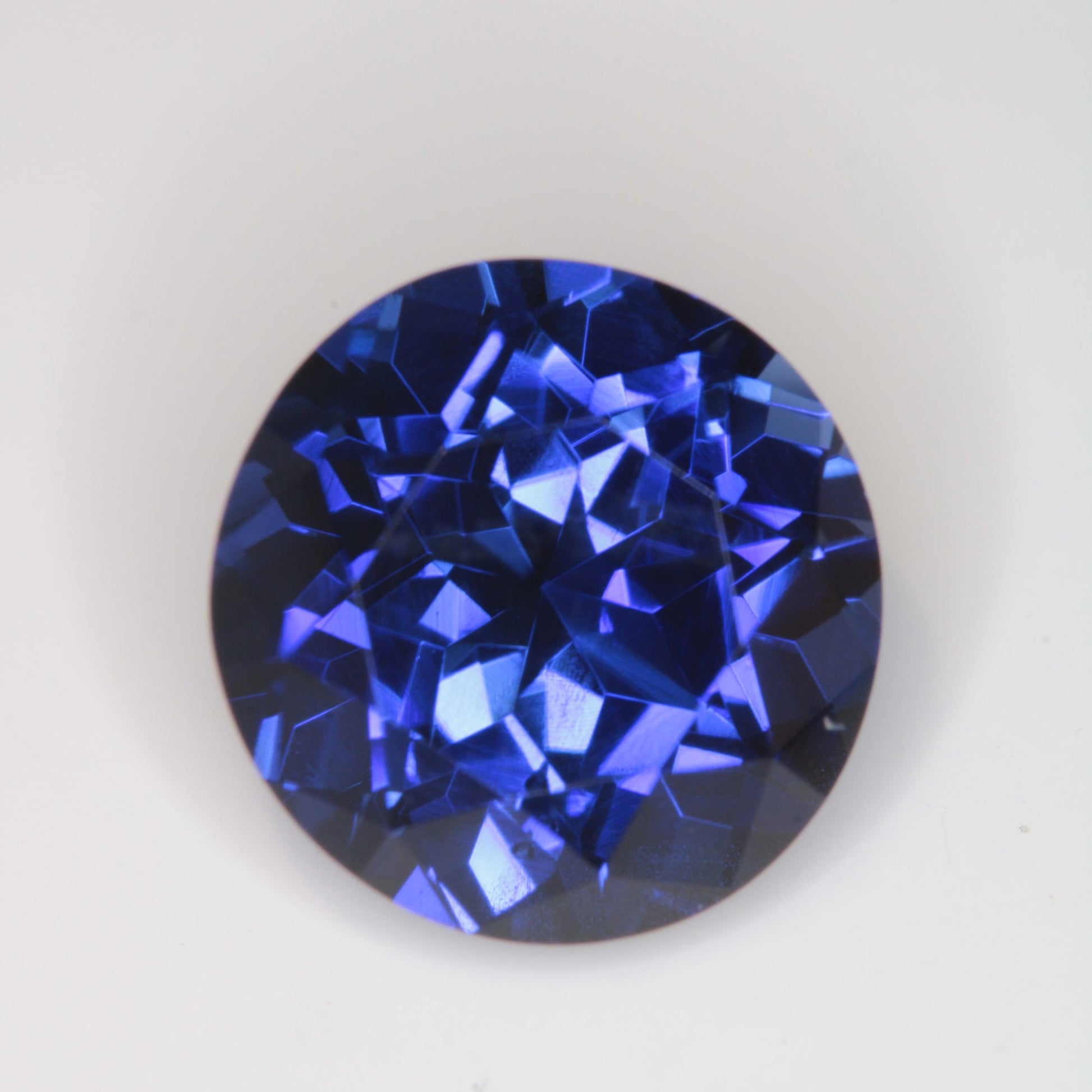 Faceted Flame Fusion Blue Sapphire Round Gemstone
