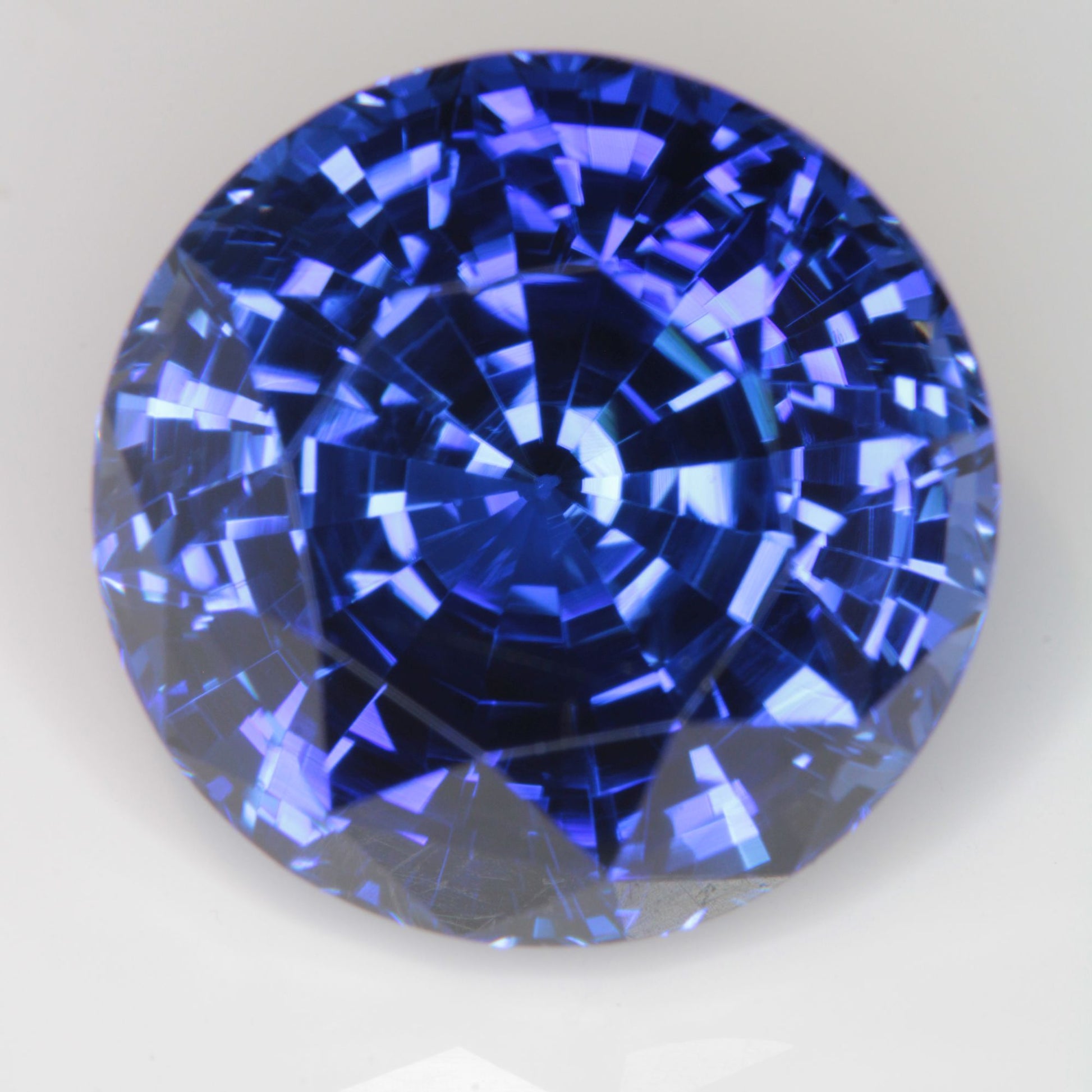 Faceted Flame Fusion Blue Sapphire Round Gemstone