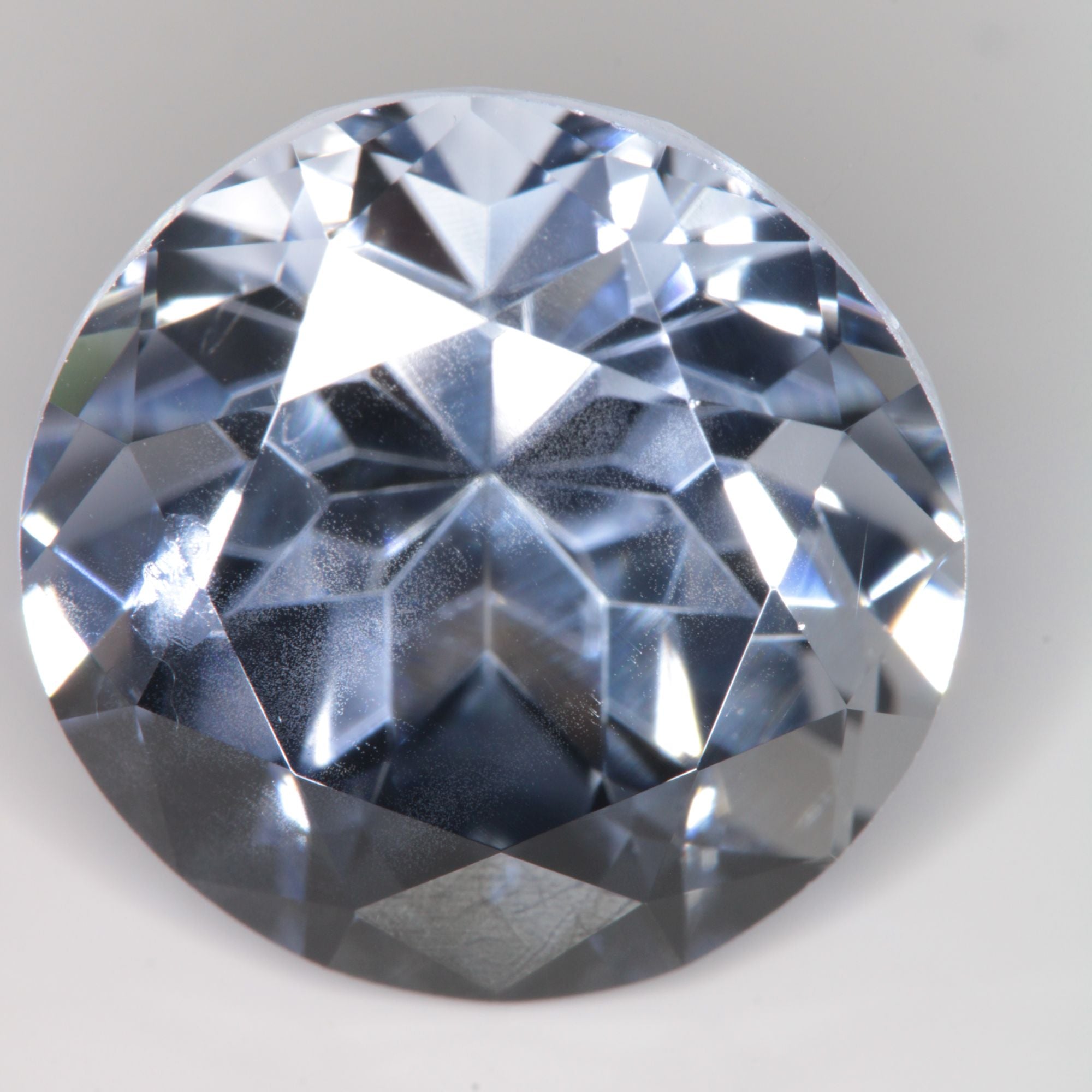 Faceted Flame Fusion Blue Sapphire Round Gemstone