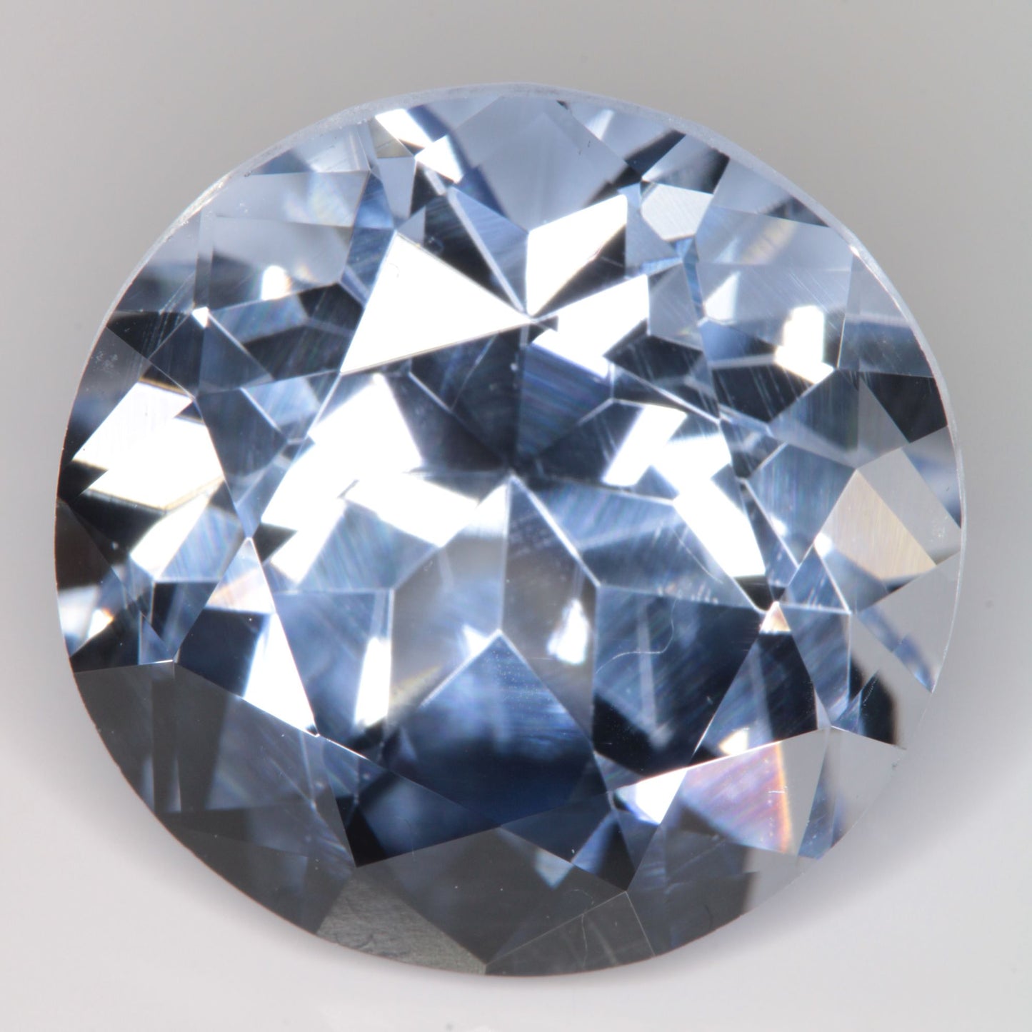 Faceted Flame Fusion Blue Sapphire Round Gemstone