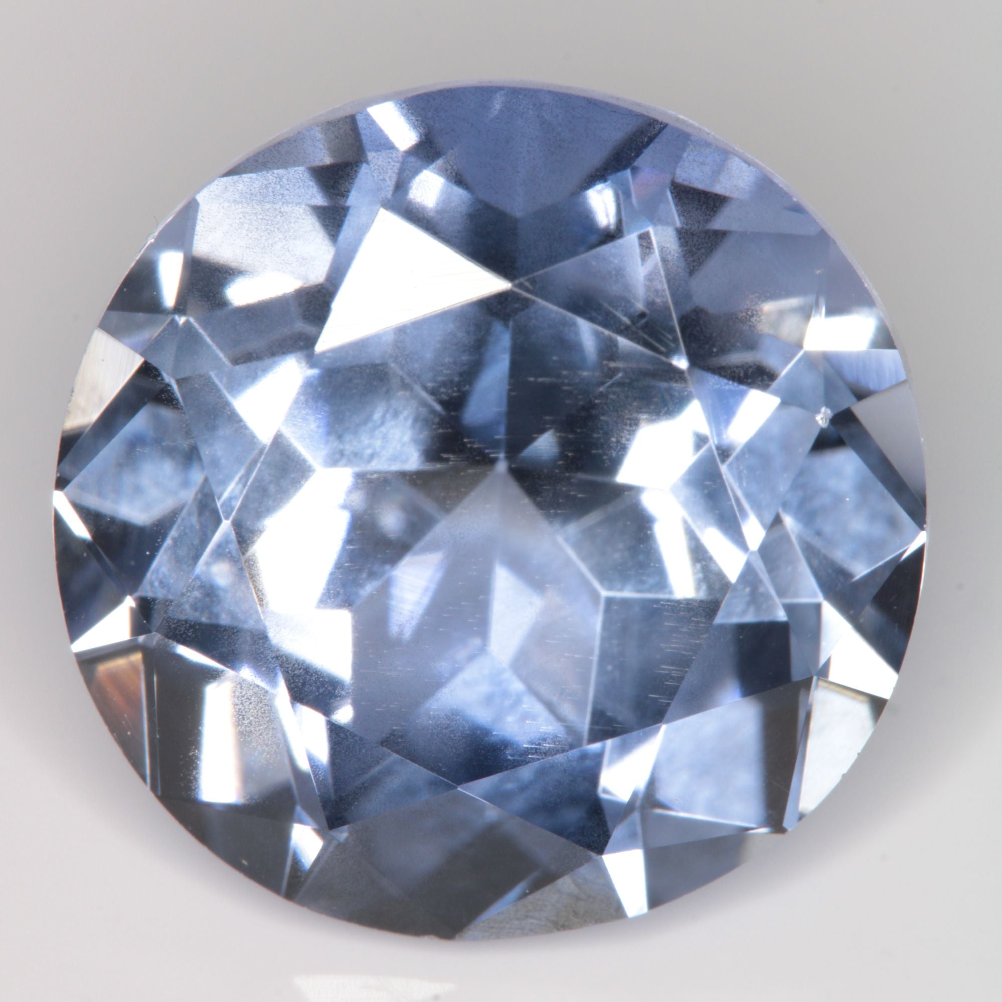 Faceted Flame Fusion Blue Sapphire Round Gemstone