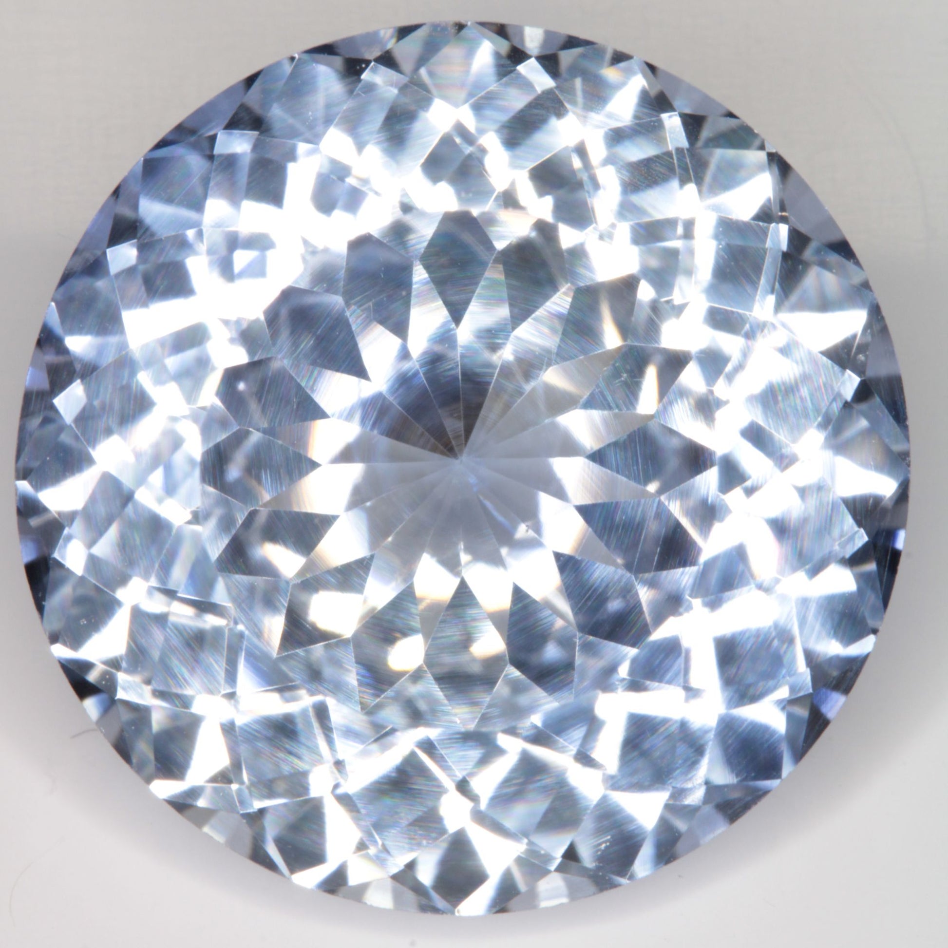 Faceted Flame Fusion Blue Sapphire Round Gemstone