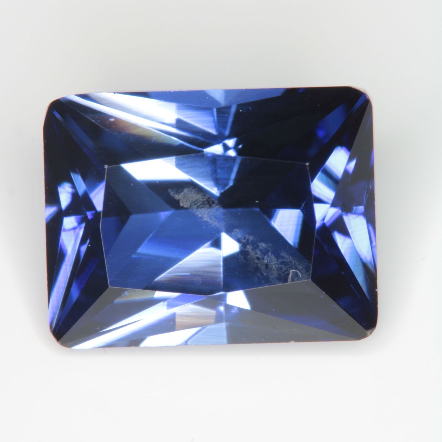 Faceted Flame Fusion Blue Sapphire Rectangle Gemstone