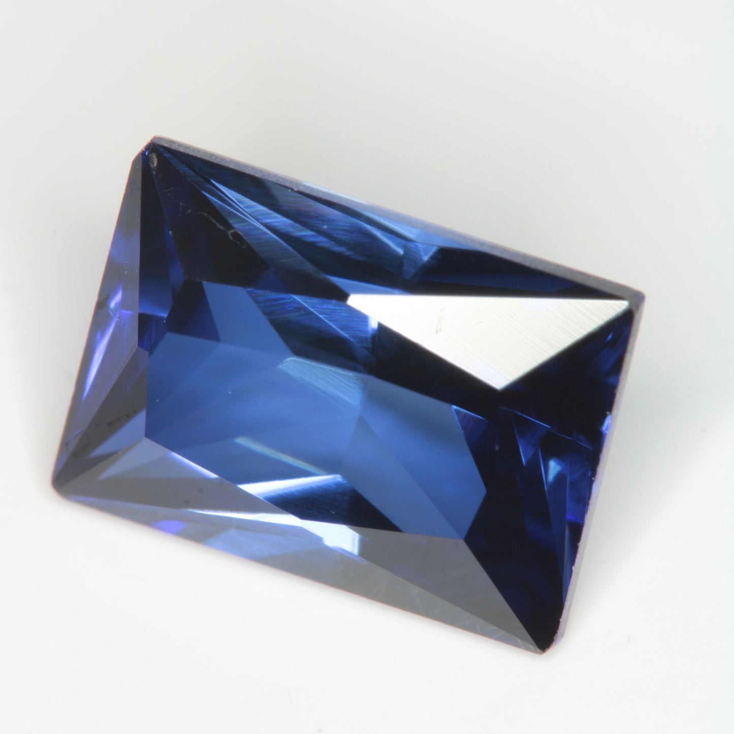 Faceted Flame Fusion Blue Sapphire Rectangle Gemstone