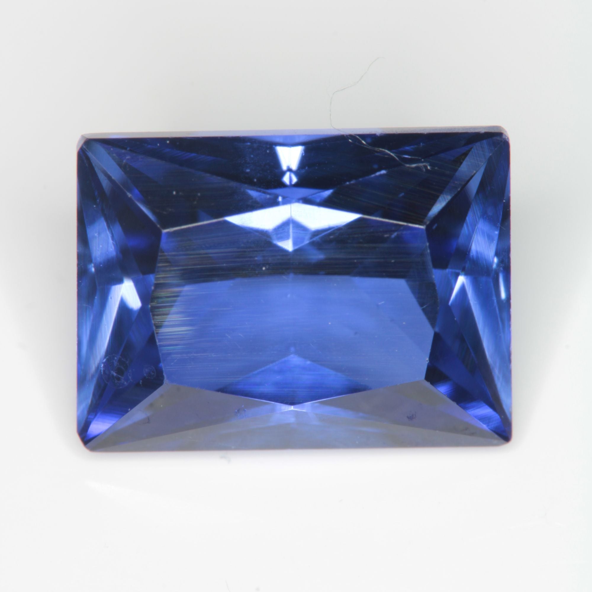 Faceted Flame Fusion Blue Sapphire Rectangle Gemstone