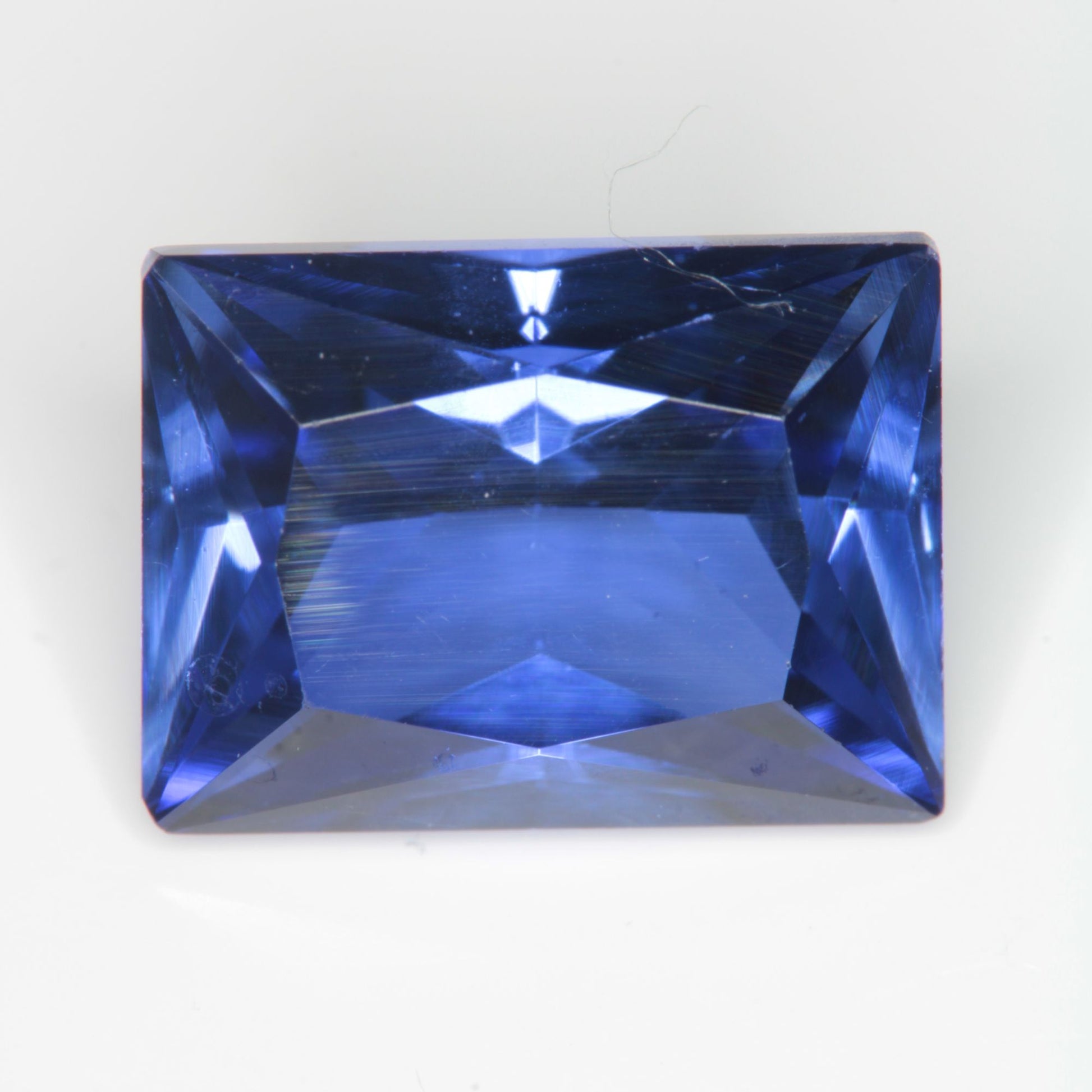 Faceted Flame Fusion Blue Sapphire Rectangle Gemstone