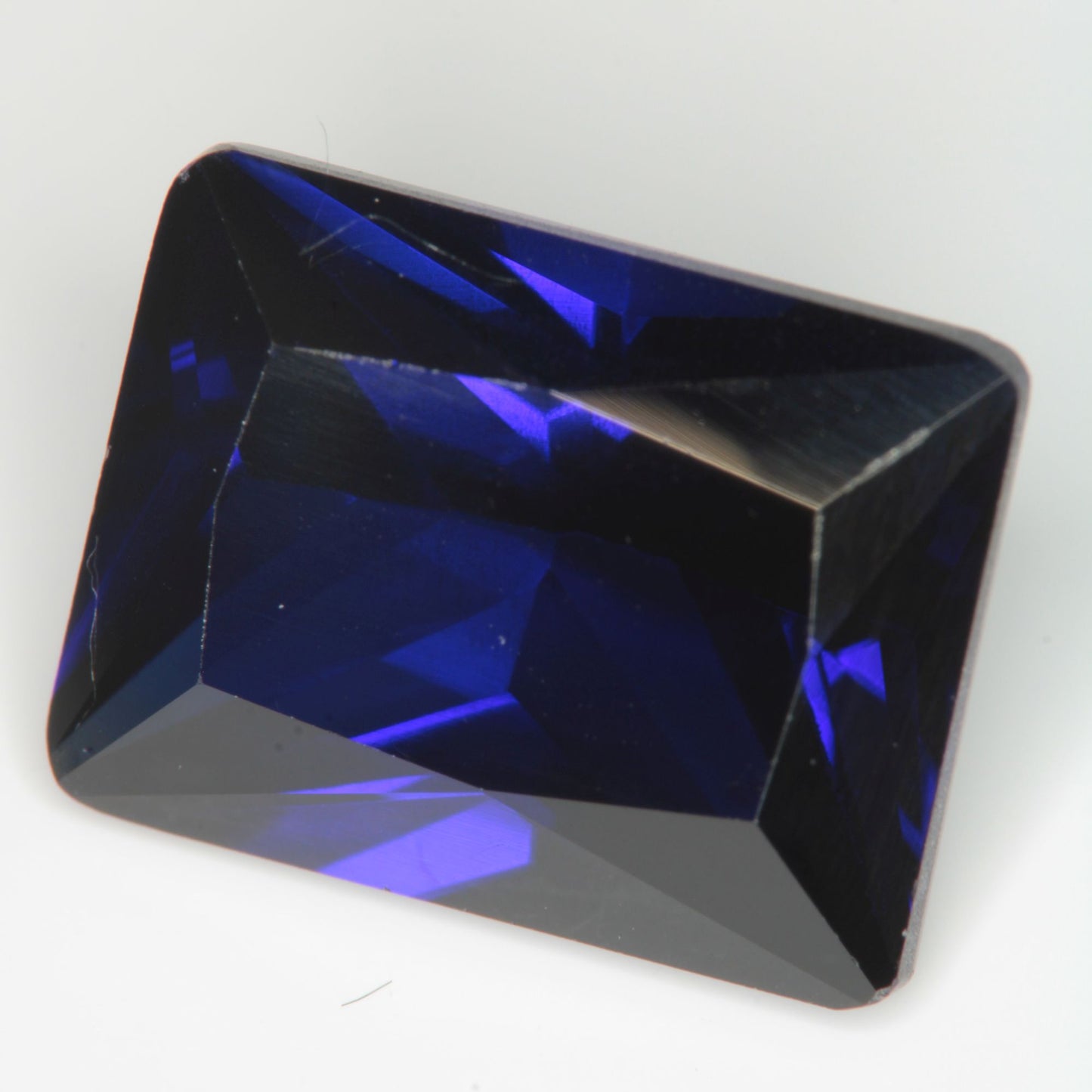 Faceted Flame Fusion Blue Sapphire Rectangle Gemstone