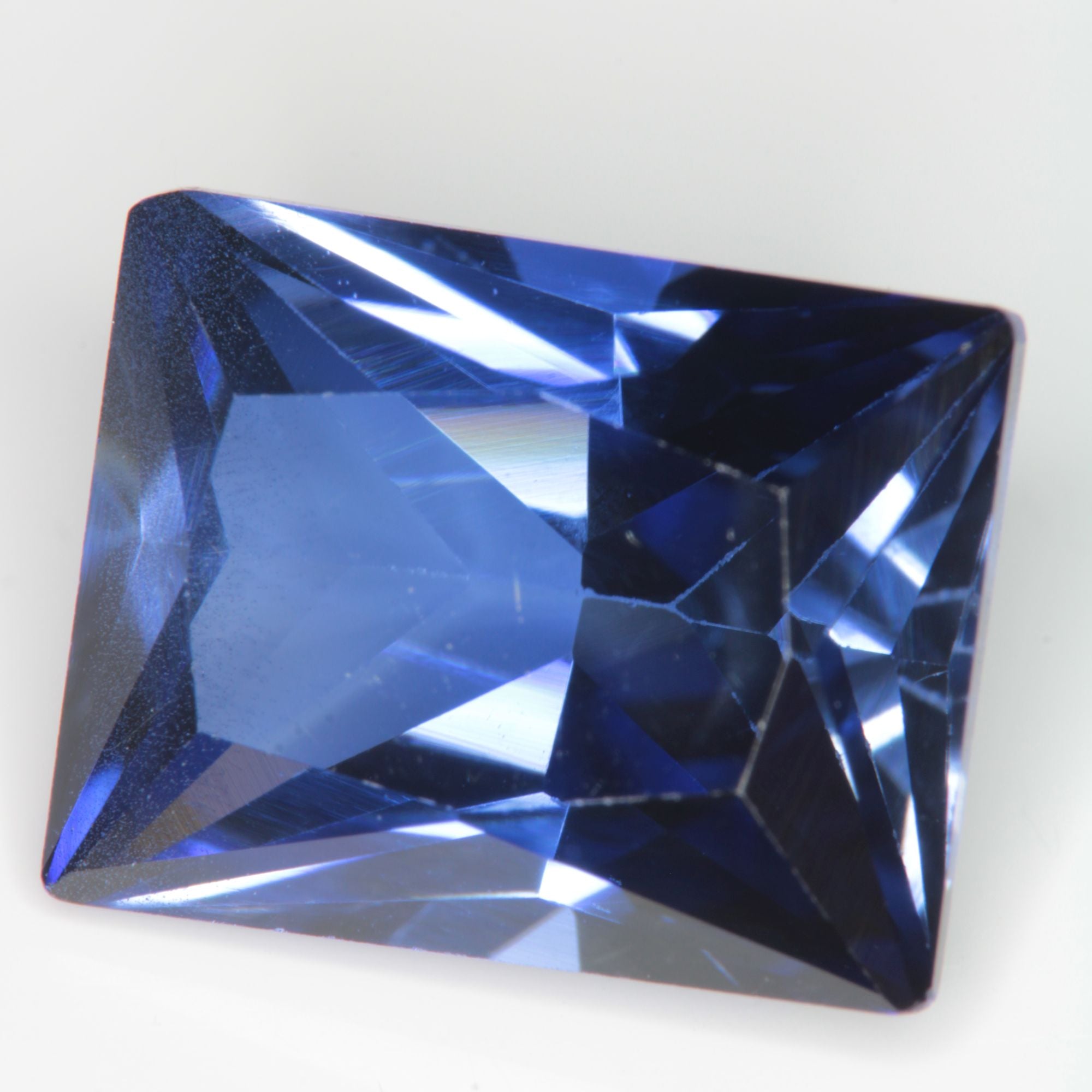 Faceted Flame Fusion Blue Sapphire Rectangle Gemstone