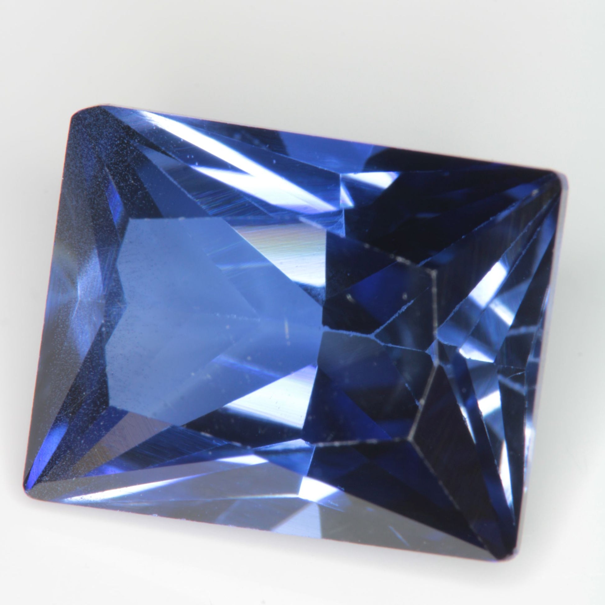 Faceted Flame Fusion Blue Sapphire Rectangle Gemstone