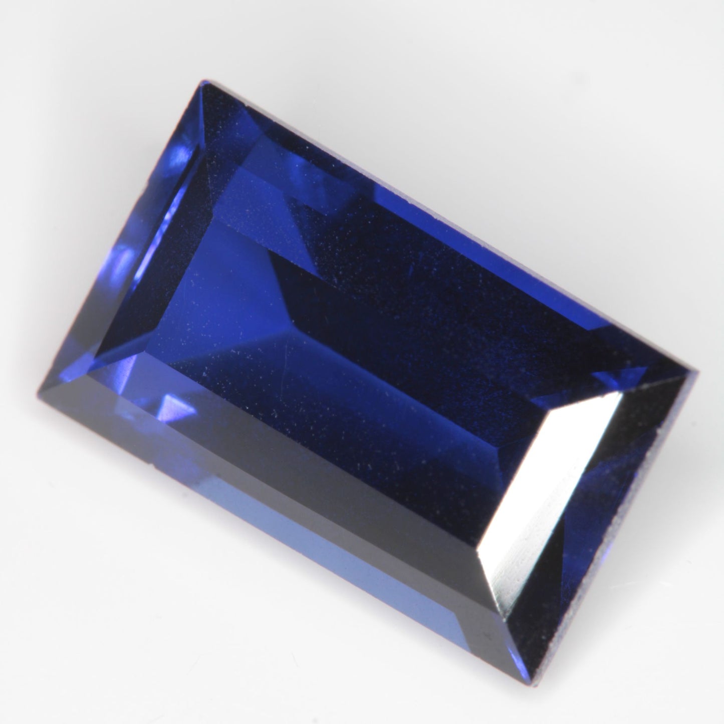 Faceted Flame Fusion Blue Sapphire Rectangle Gemstone