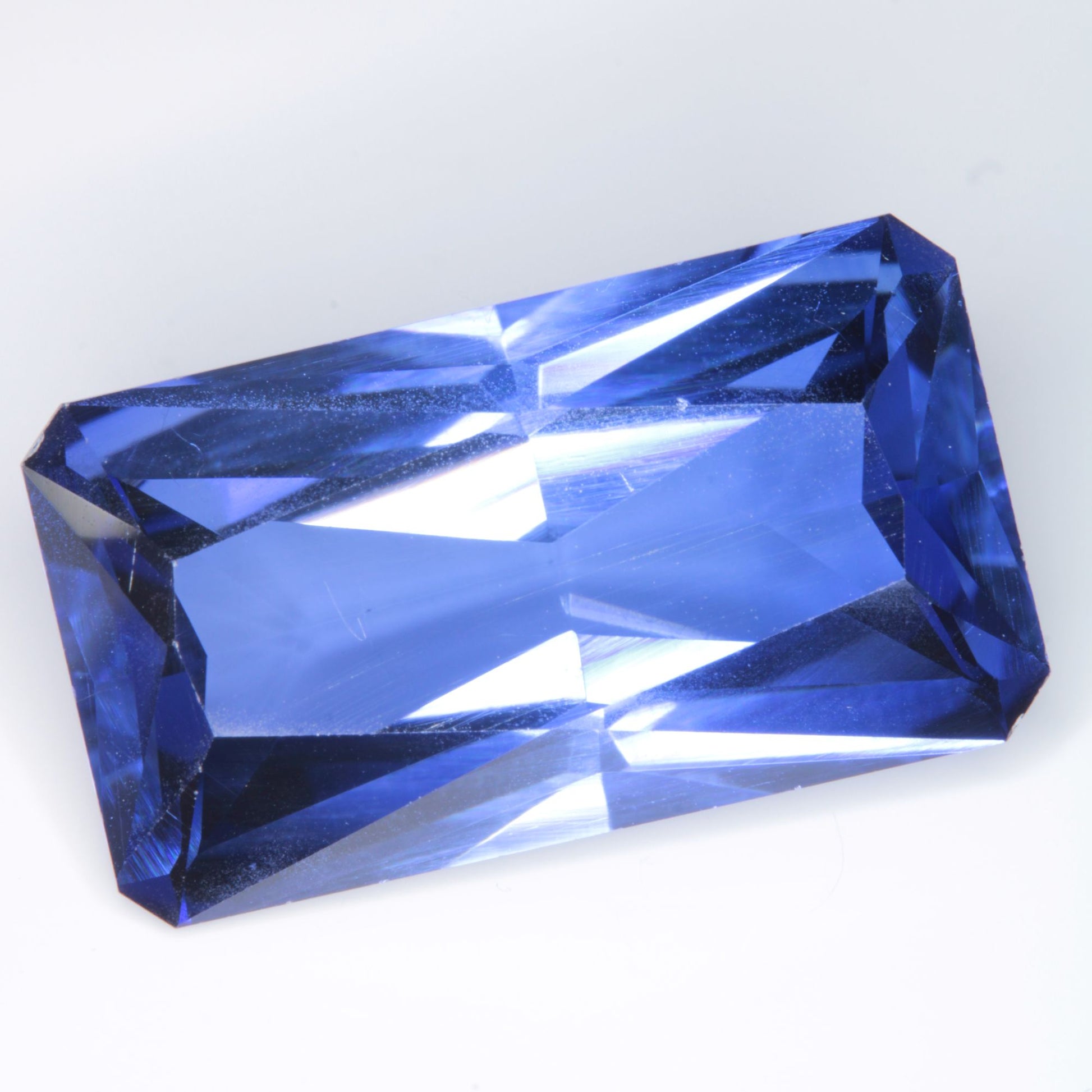 Faceted Flame Fusion Blue Sapphire Rectangle Gemstone