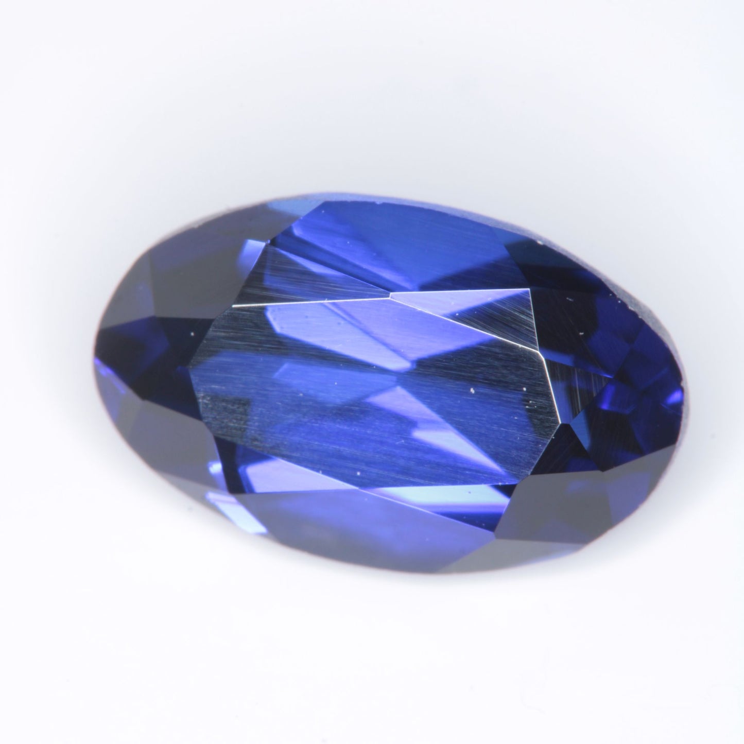 Faceted Flame Fusion Blue Sapphire Oval Gemstone