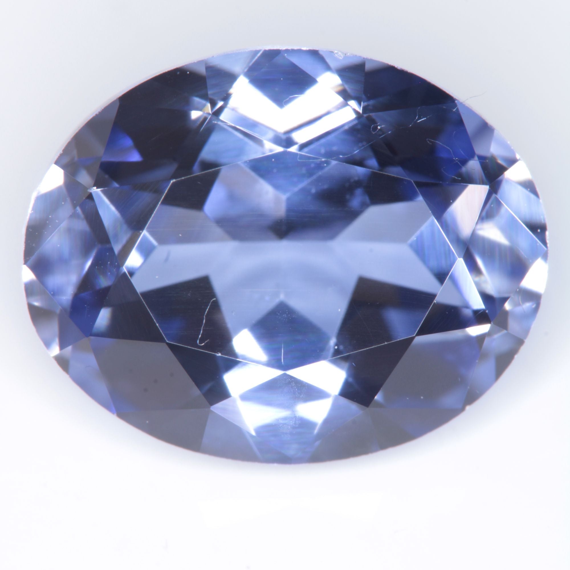 Faceted Flame Fusion Blue Sapphire Oval Gemstone