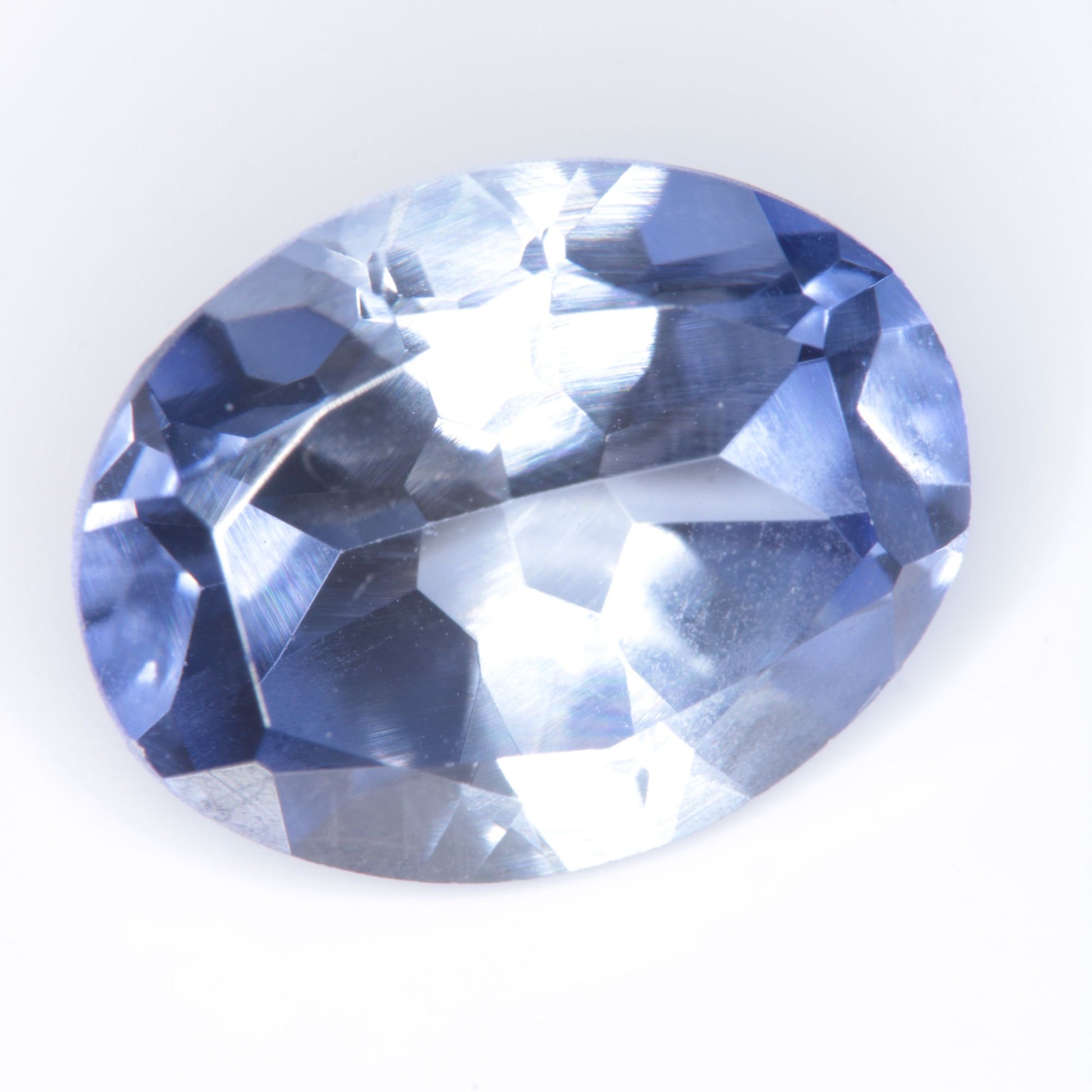 Faceted Flame Fusion Blue Sapphire Oval Gemstone
