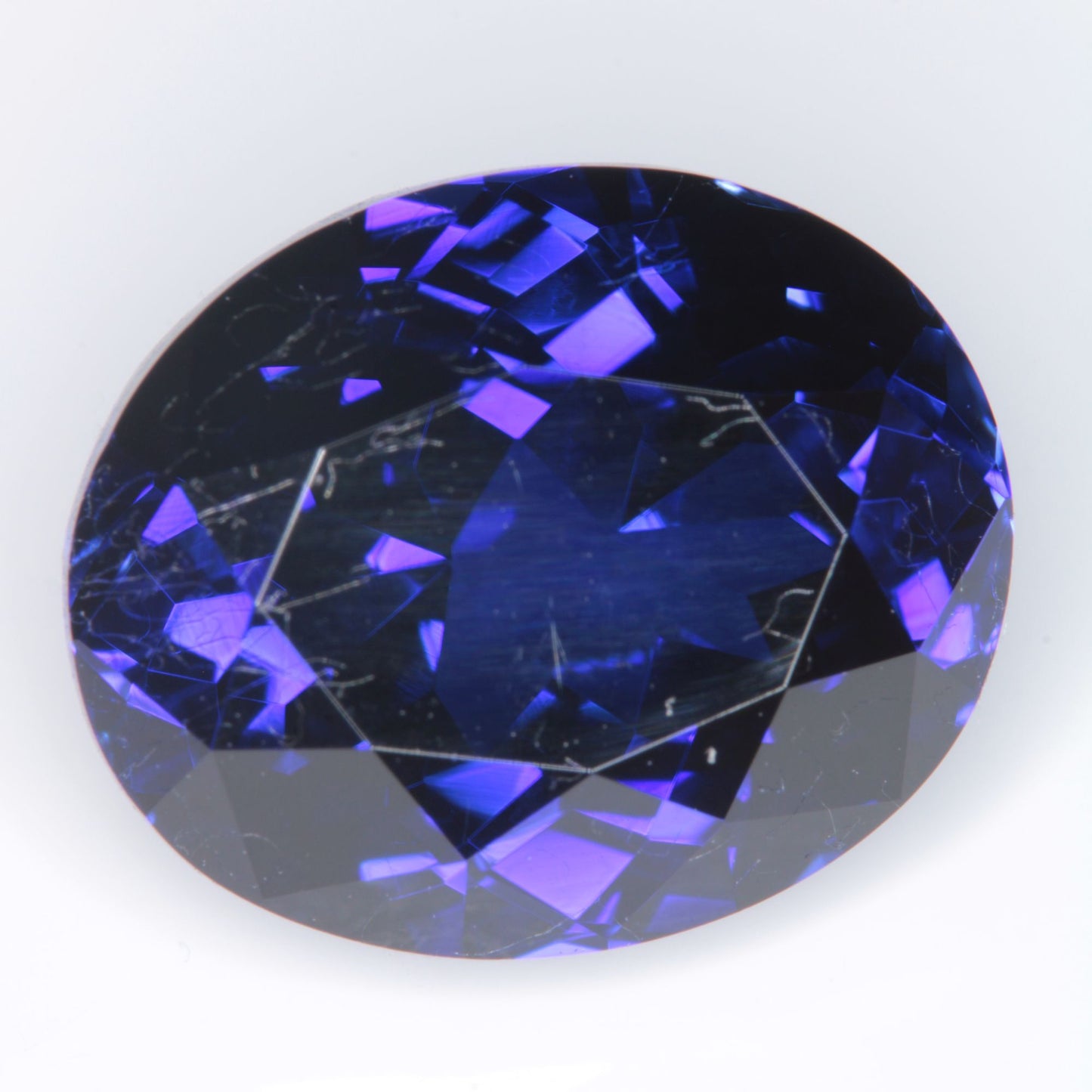 Faceted Flame Fusion Blue Sapphire Oval Gemstone