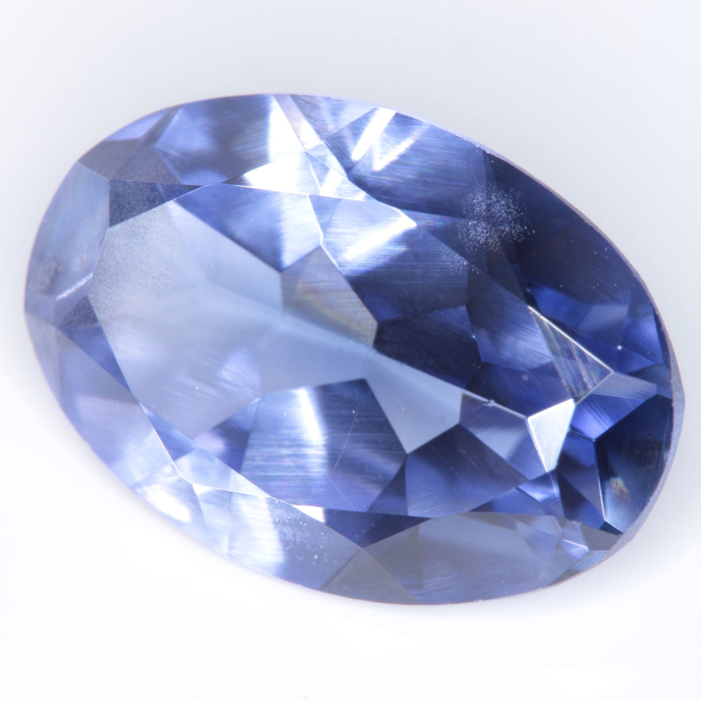 Faceted Flame Fusion Blue Sapphire Oval Gemstone