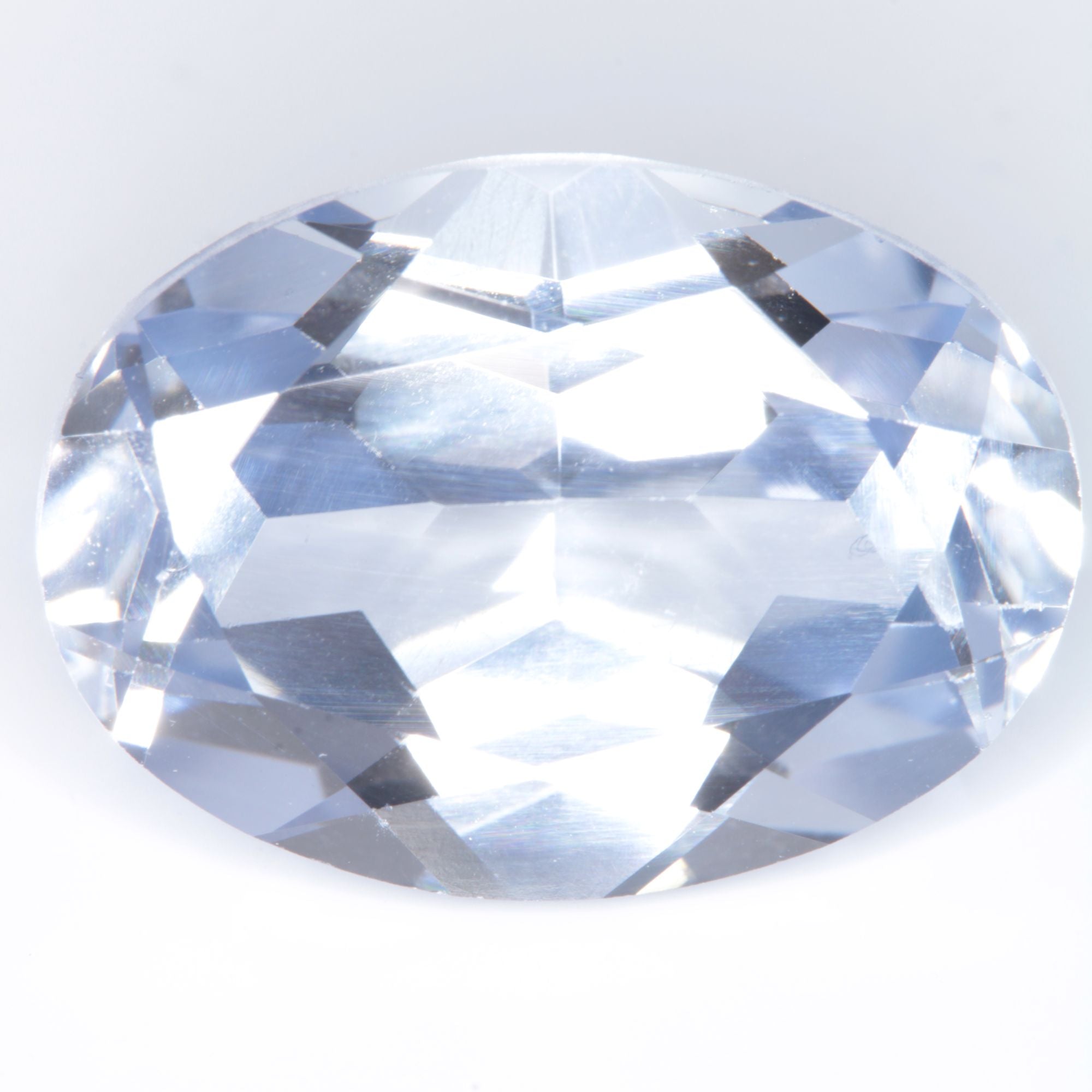 Faceted Flame Fusion Blue Sapphire Oval Gemstone