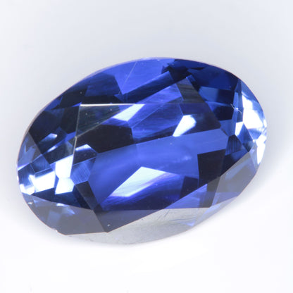 Faceted Flame Fusion Blue Sapphire Oval Gemstone