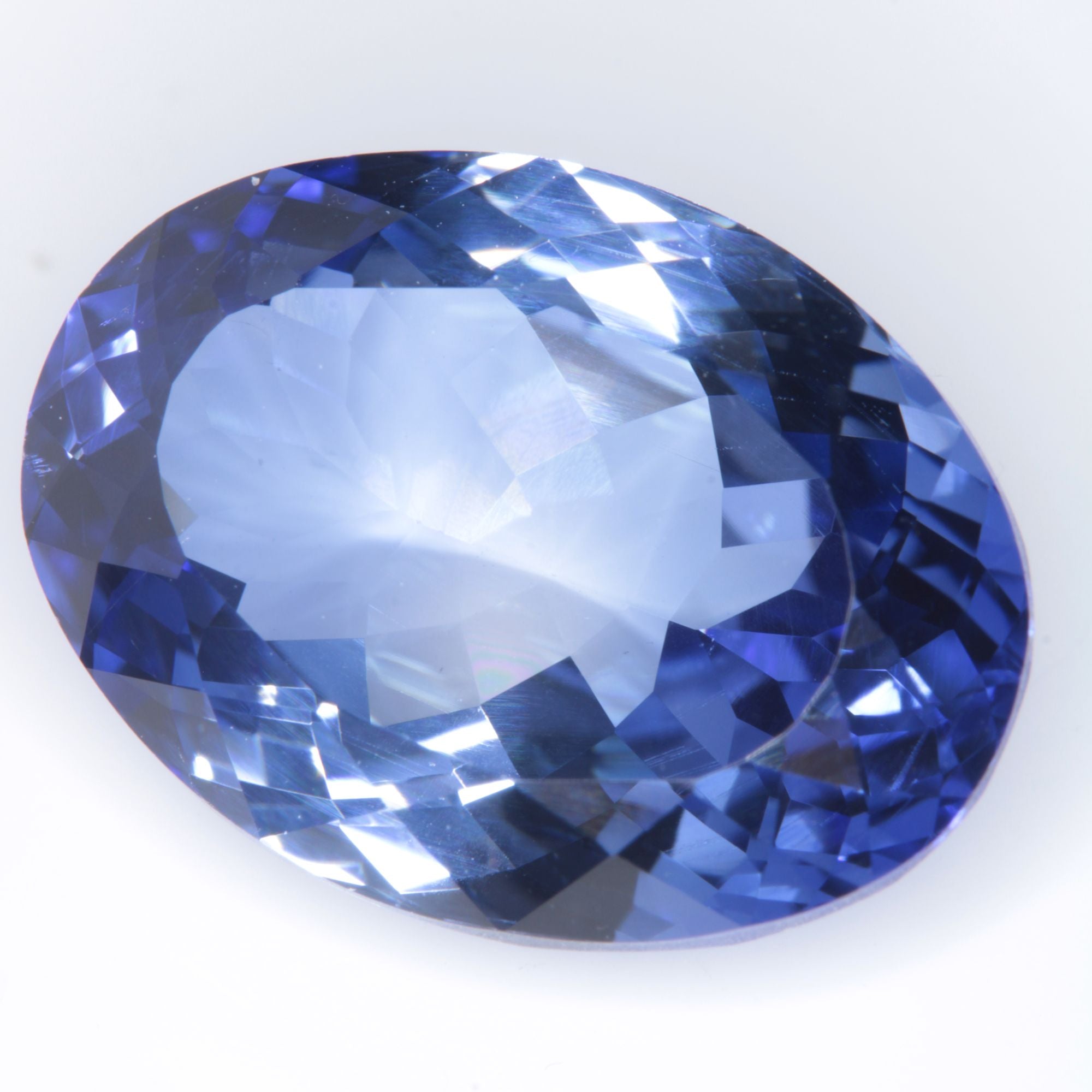 Faceted Flame Fusion Blue Sapphire Oval Gemstone