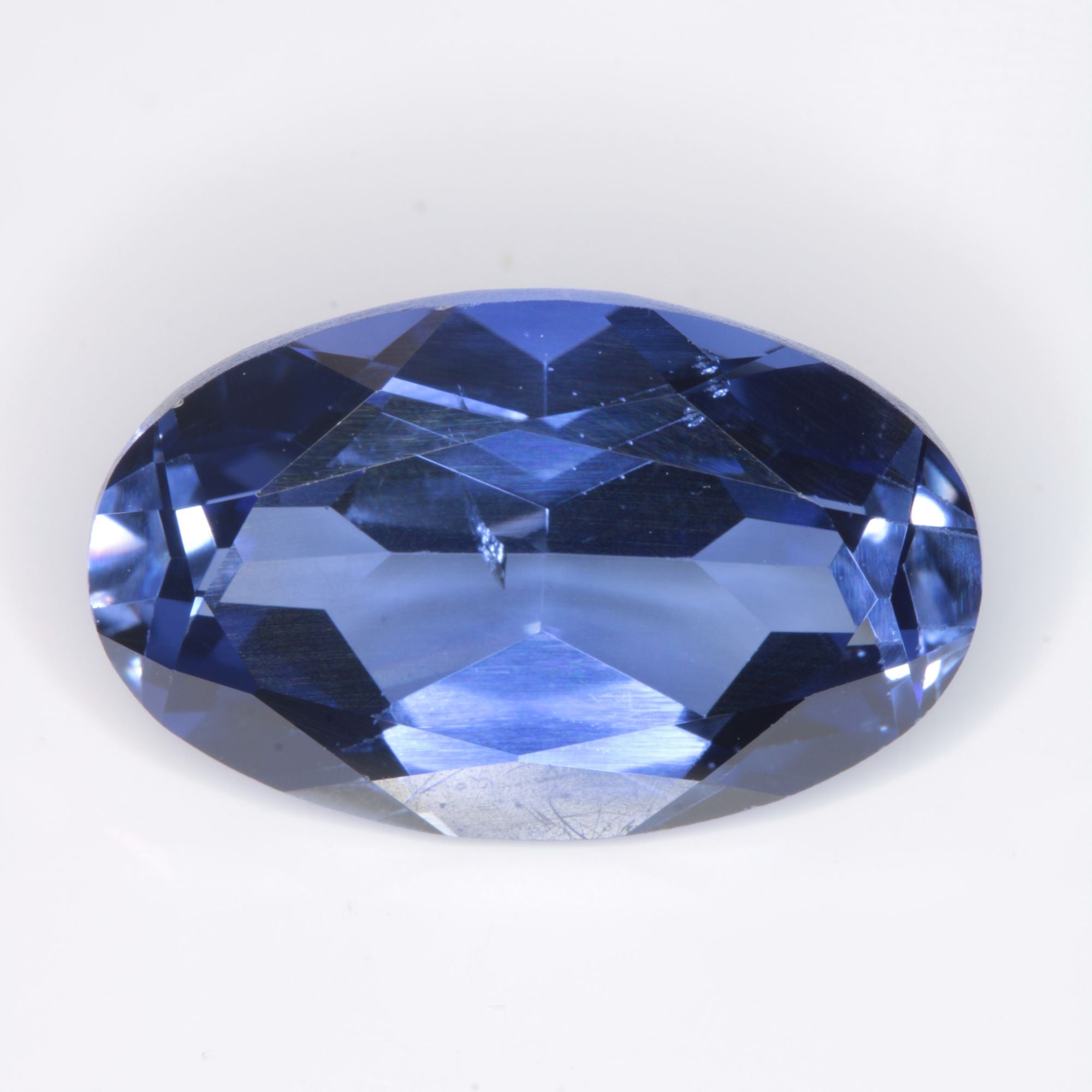 Faceted Flame Fusion Blue Sapphire Oval (Fractured) Gemstone