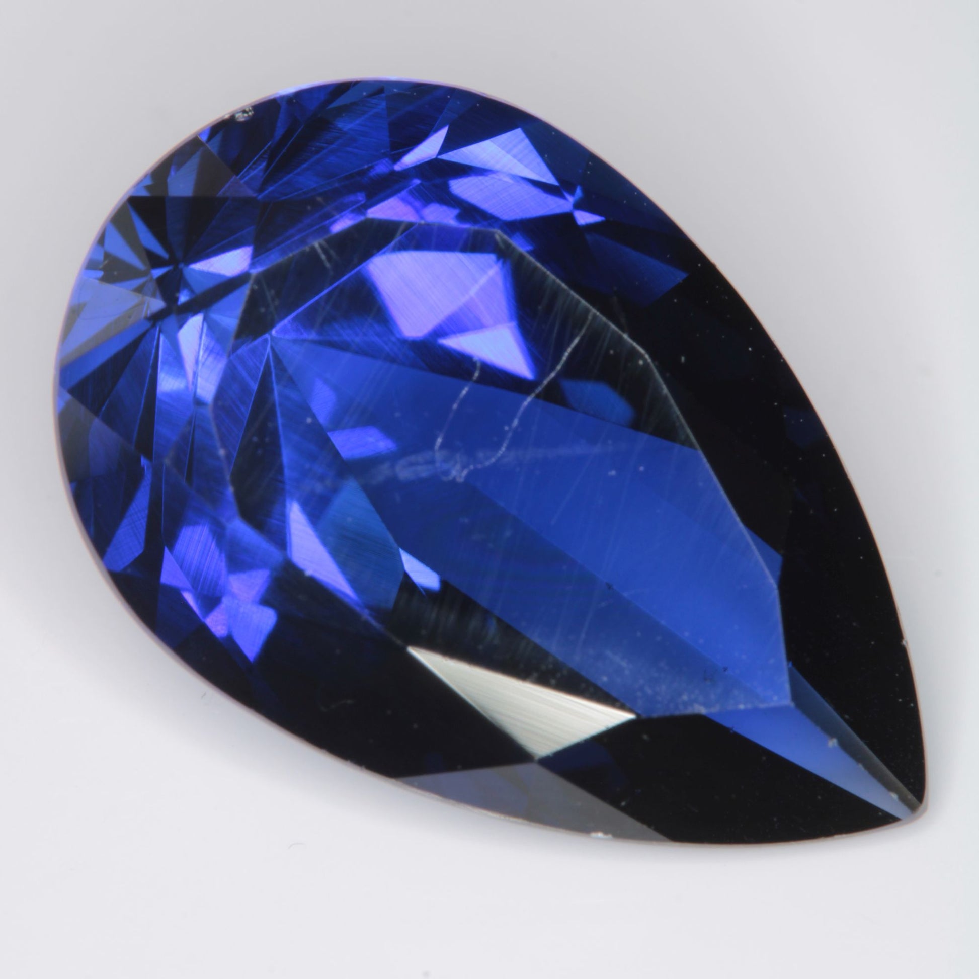 Faceted Flame Fusion Blue Sapphire Teardrop Gemstone