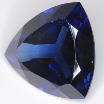 Faceted Flame Fusion Blue Sapphire Trillion Gemstone