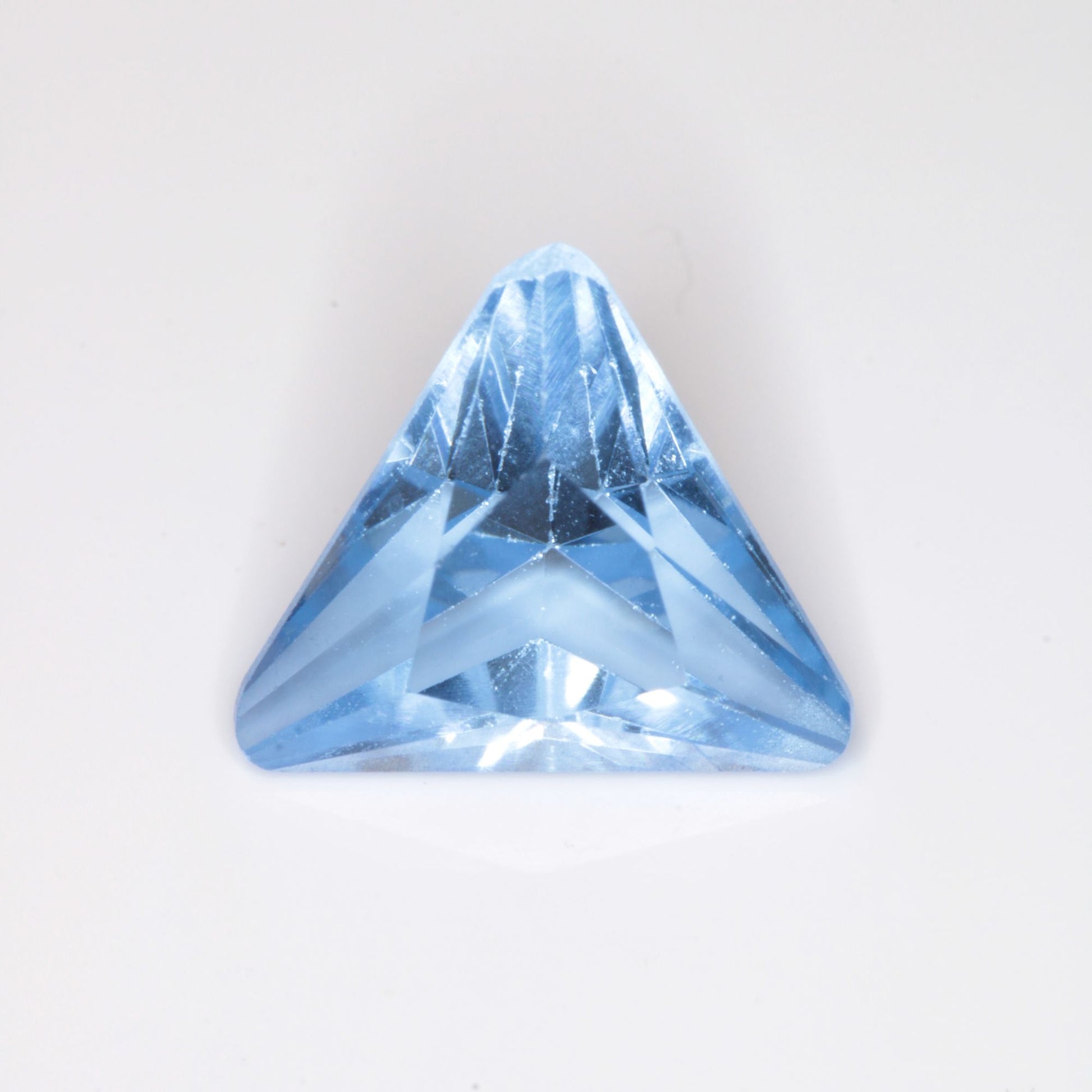 Faceted Flame Fusion Blue Spinel Trillion Cut Gemstone