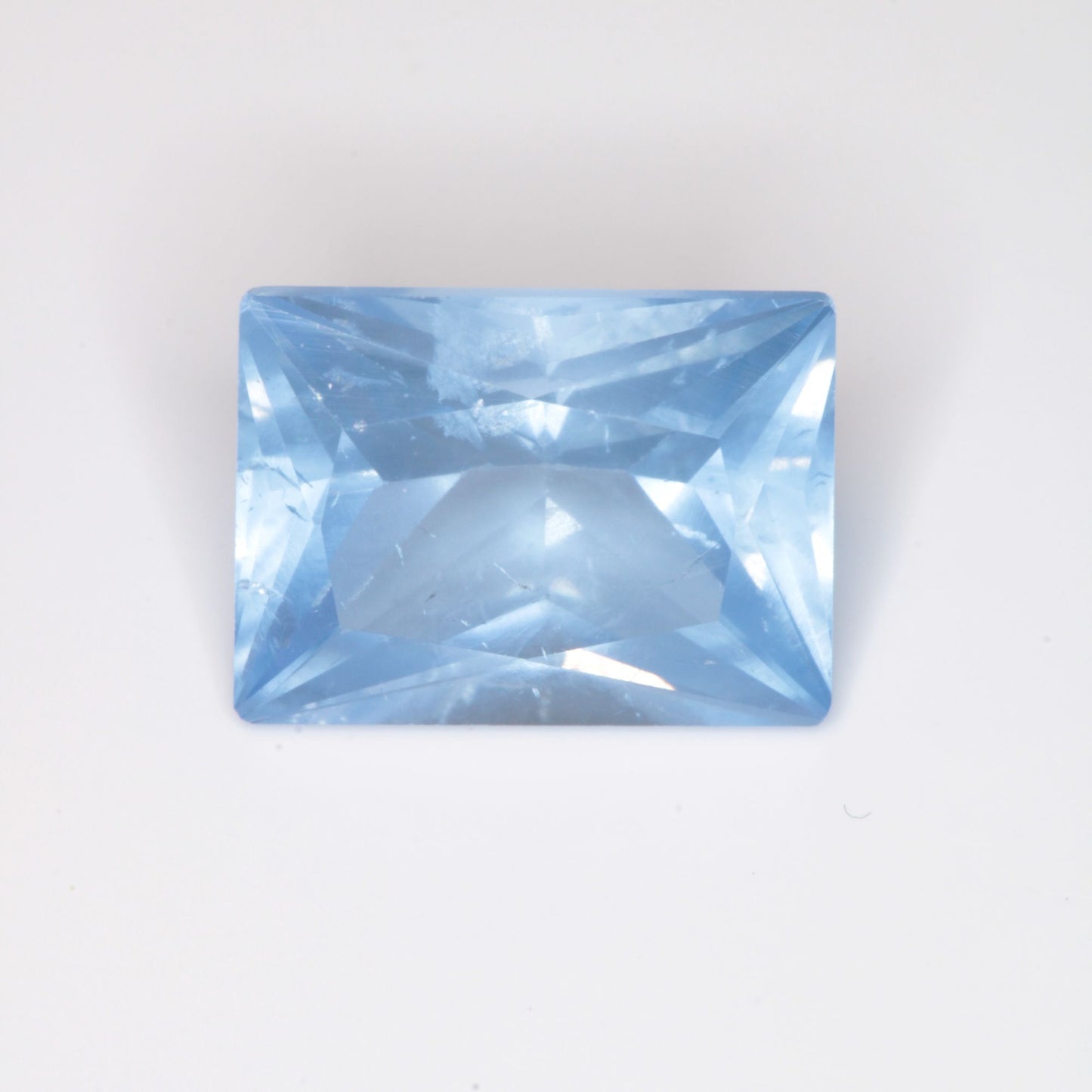 Faceted Flame Fusion Blue Spinel Frosted Rectangle Cut Gemstone