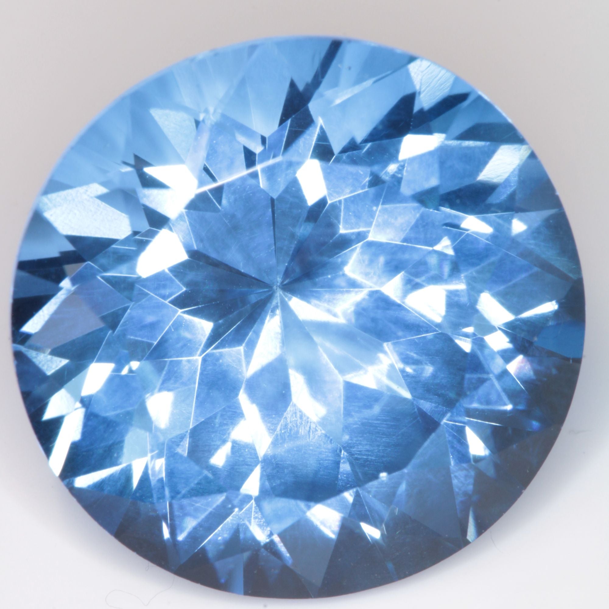 Faceted Flame Fusion Blue Spinel Round Cut Gemstone
