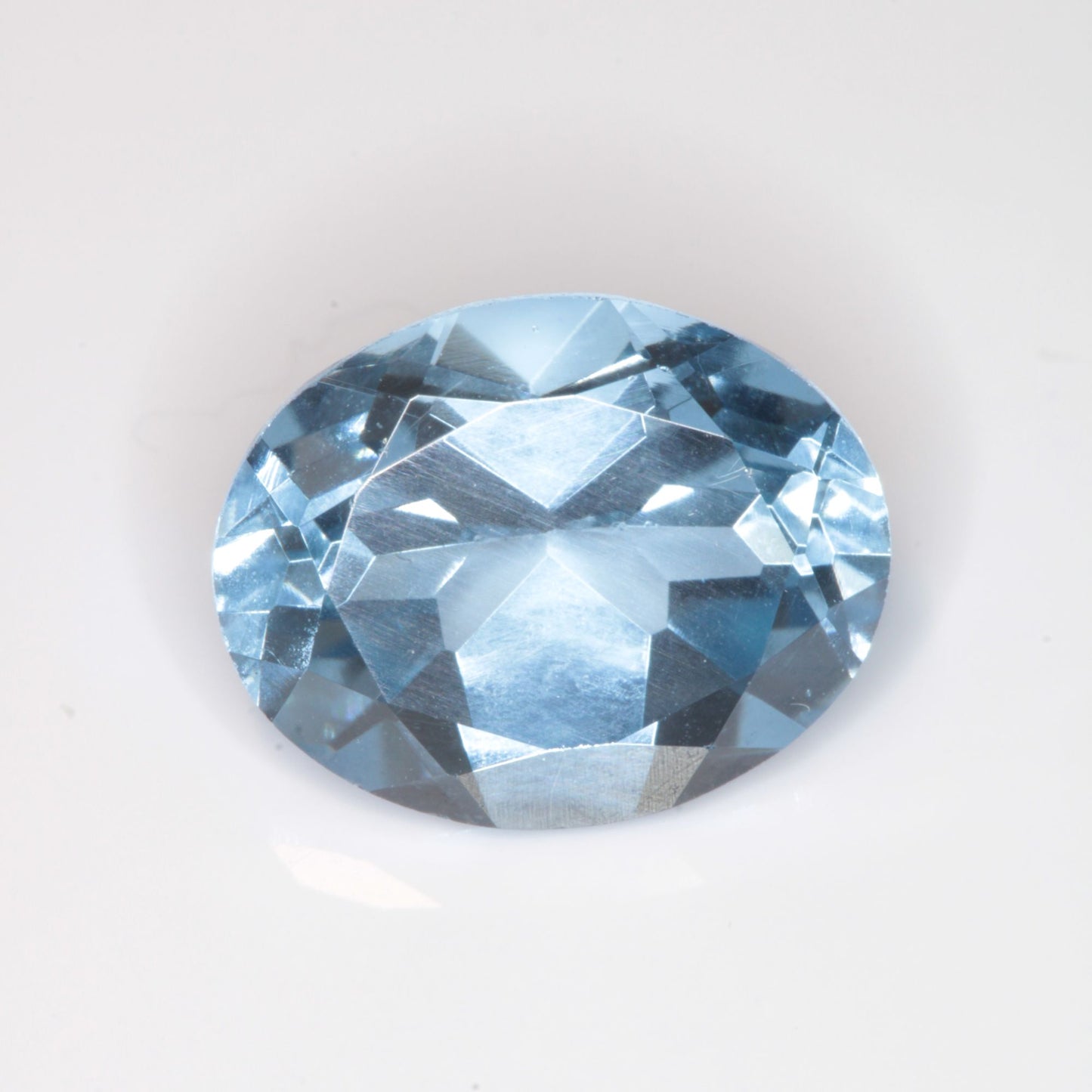 Faceted Flame Fusion Blue Spinel Oval Cut Gemstone