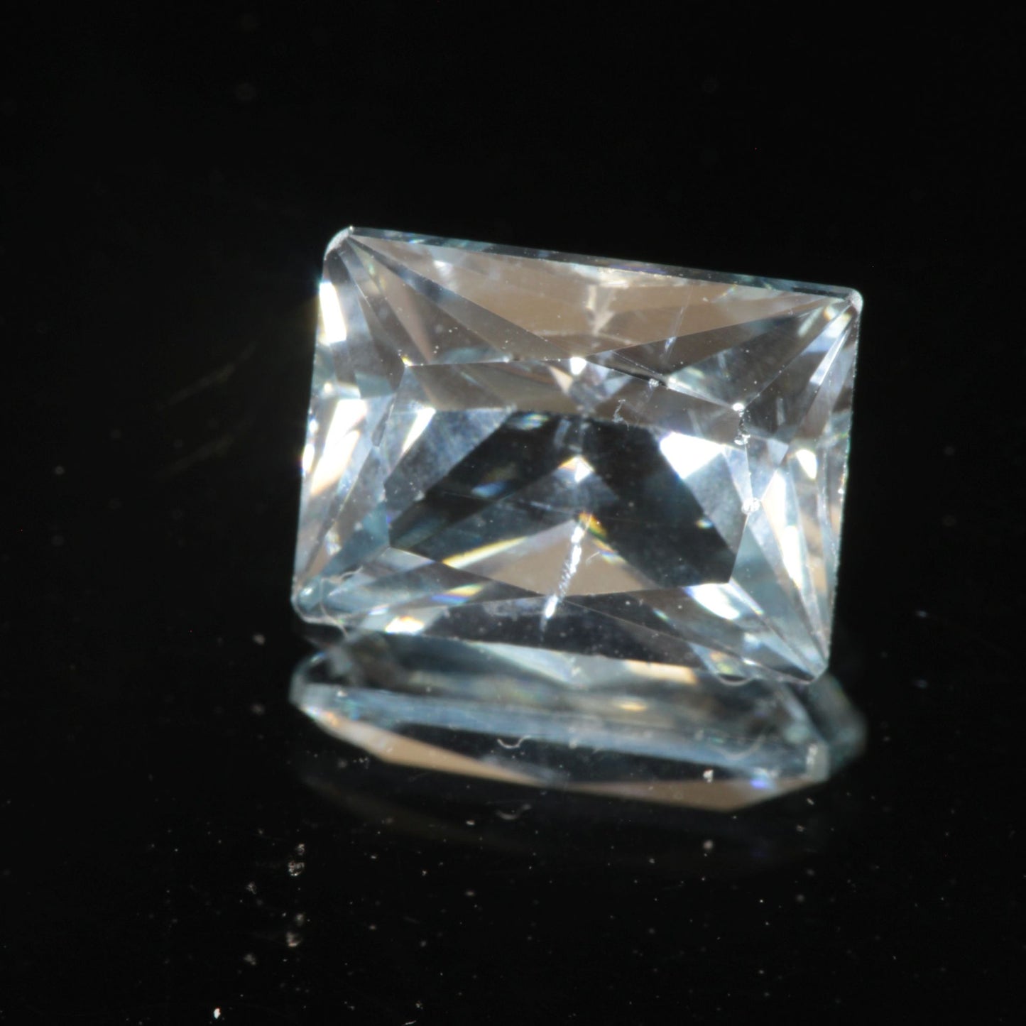 Faceted Flame Fusion Blue Spinel Included Rectangle Cut Gemstone