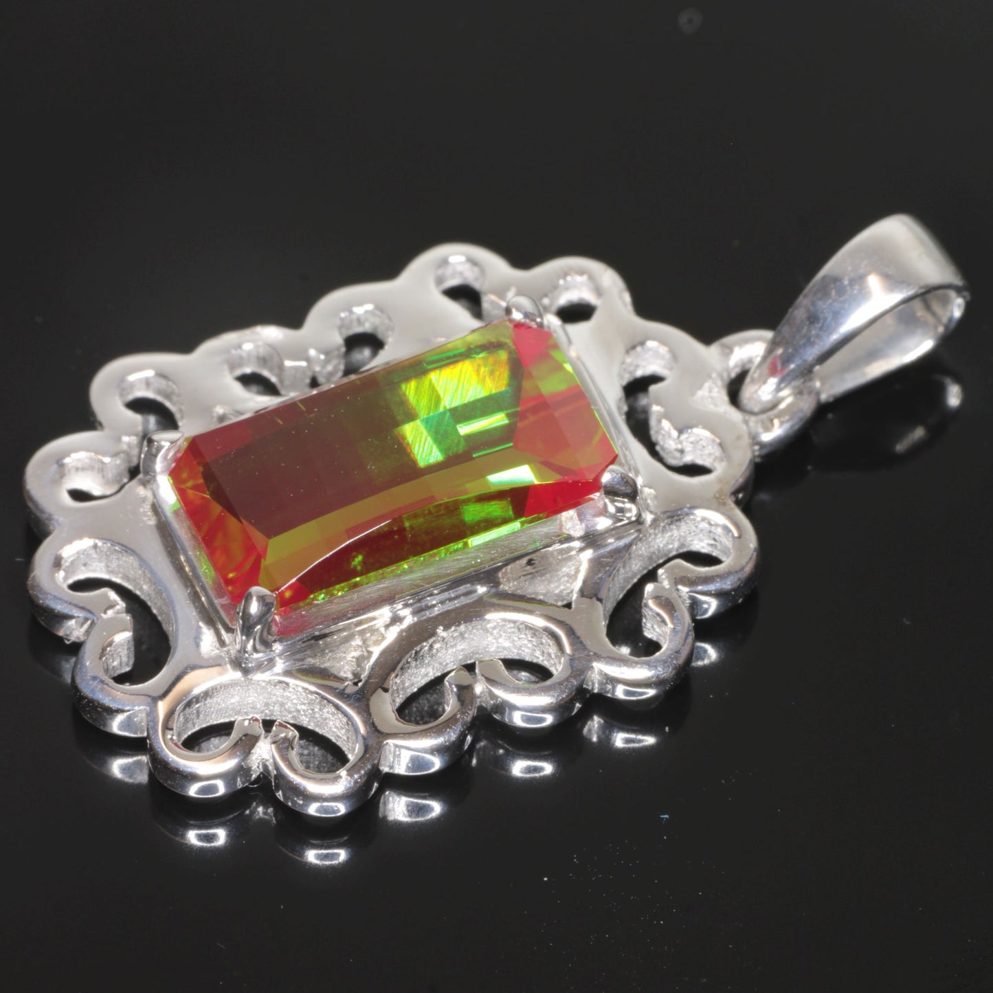 Faceted Christmas Garnet Curlicue Framed Pixel Pendant Pendant