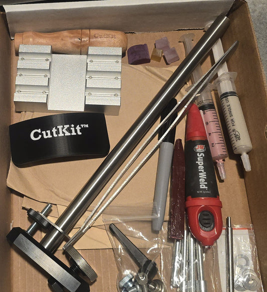 Photo of a box containing the Cutkit 2.5, showing its contents