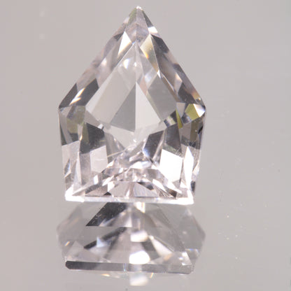faceted Pink EOTS Cut sapphire gem made from F-35 window sapphire