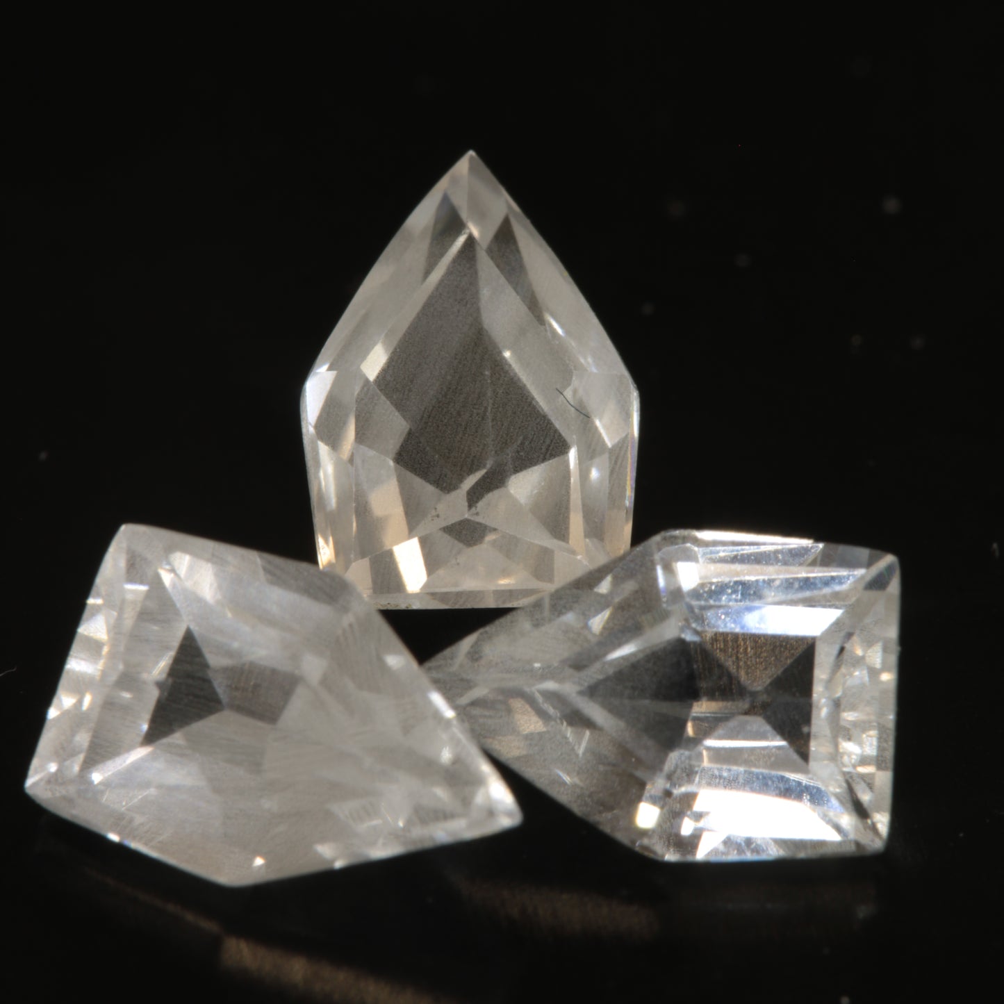 faceted Cloudy EOTS Cut sapphire gem made from F-35 window sapphire