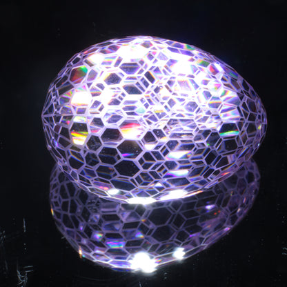 Faceted Nd:YAG Large Egg with Frosted Edges Gemstone on a black Background