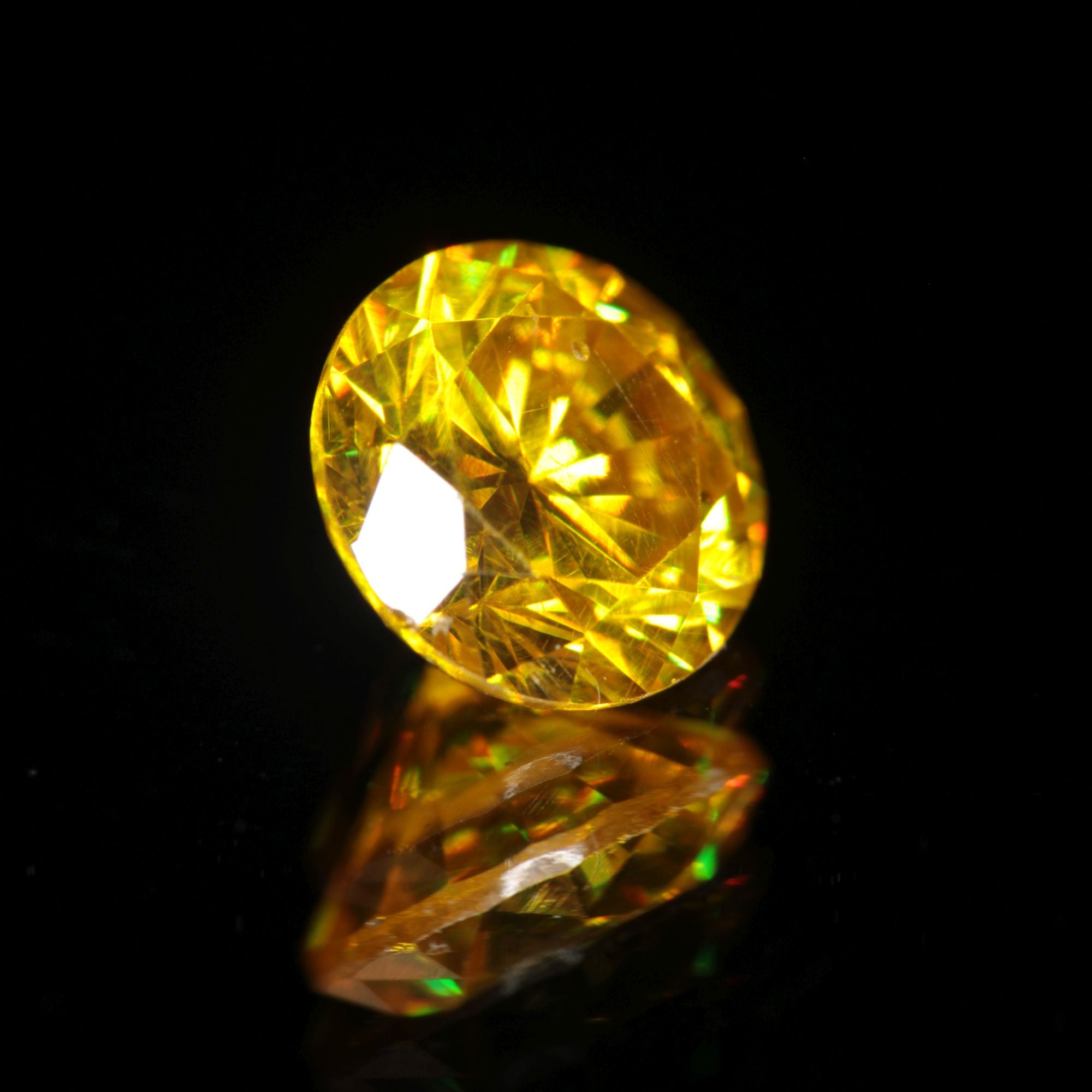 orange faceted BGO-20 round gemstone (lab sillenite), 6mm