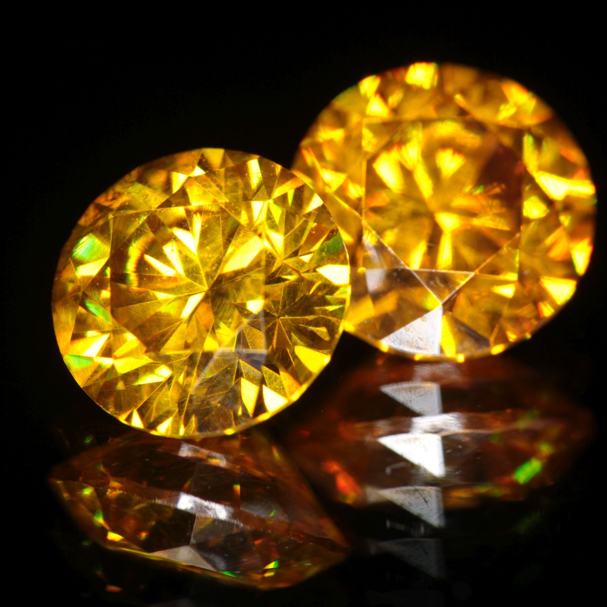 orange faceted BGO-20 round gemstone (lab sillenite), 7mm