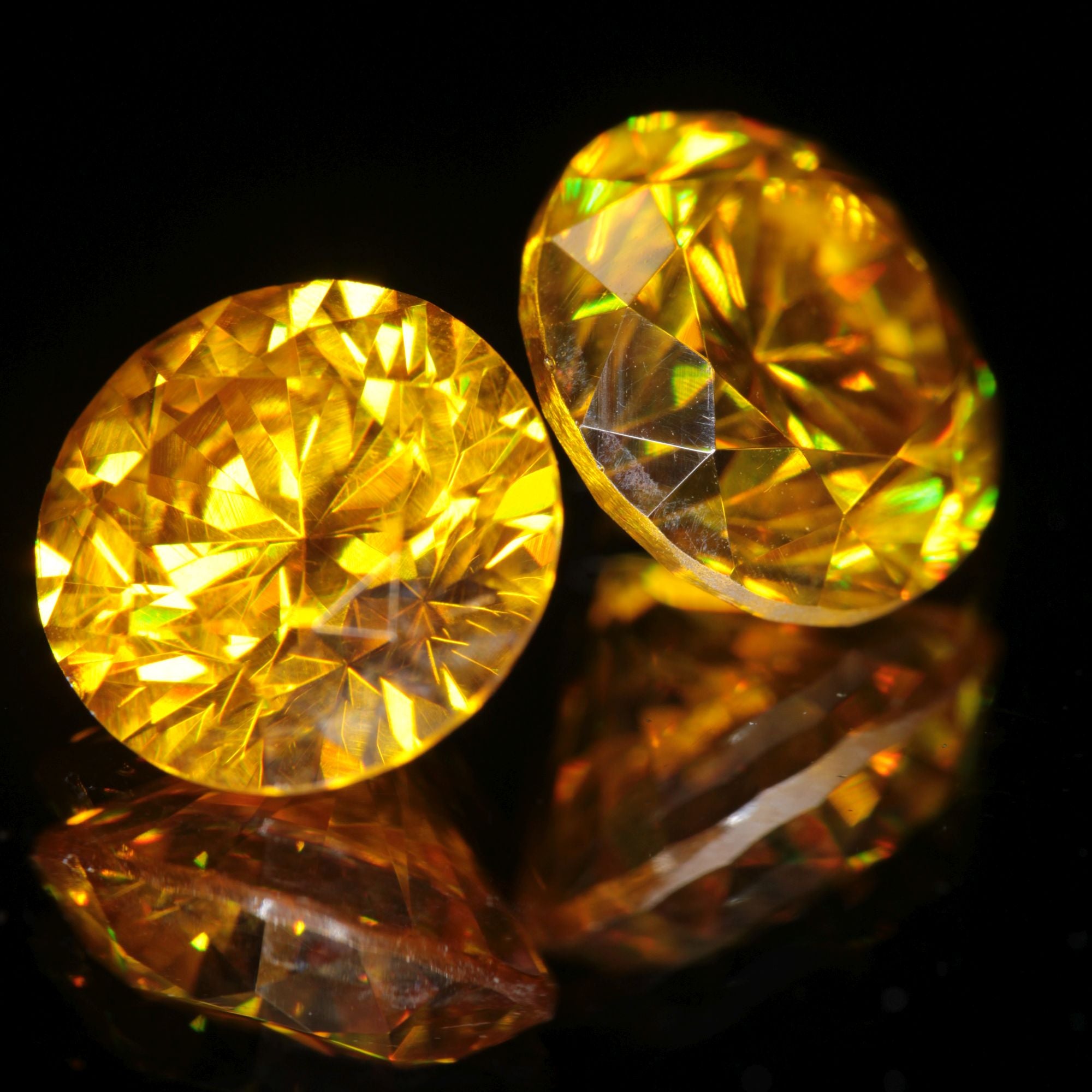 orange faceted BGO-20 round gemstone (lab sillenite), 8mm