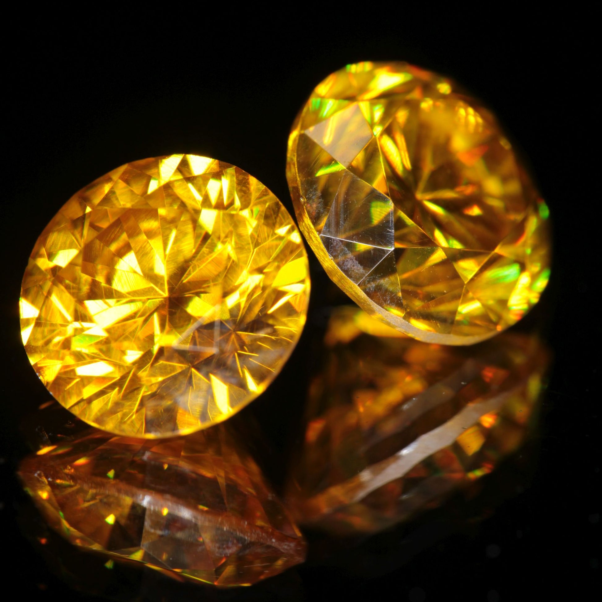 orange faceted BGO-20 round gemstone (lab sillenite), 8mm