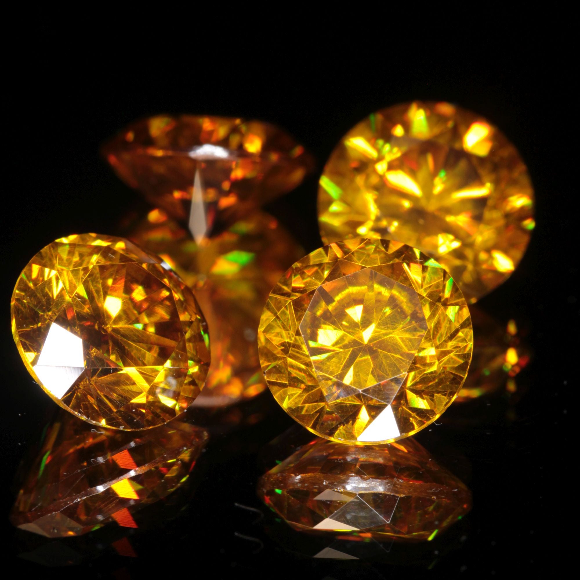orange faceted BGO-20 round gemstone (lab sillenite), 9mm