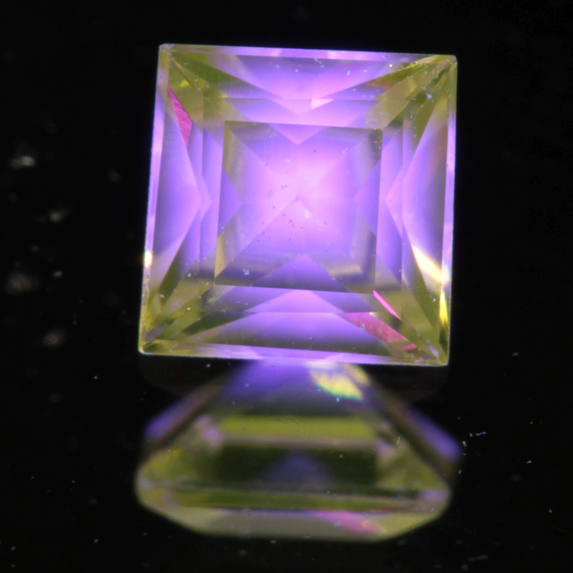 Faceted Square Ce/Nd YAG Gemstone with “Bullseye” Pink Fluorescence in the Yellow Crystal